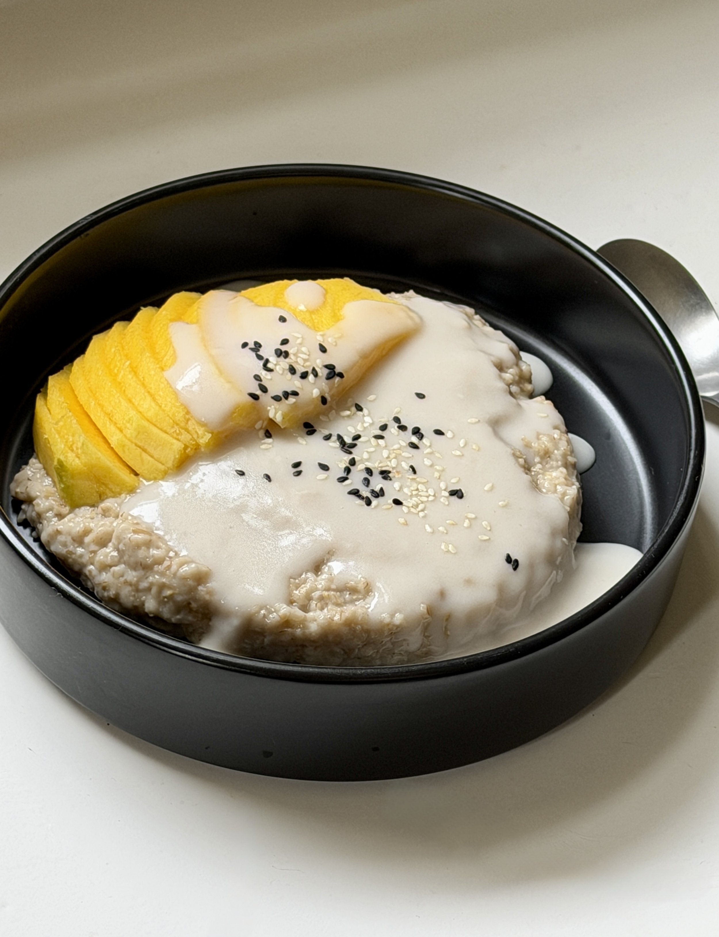 Mango sticky rice oatmeal for breakfast