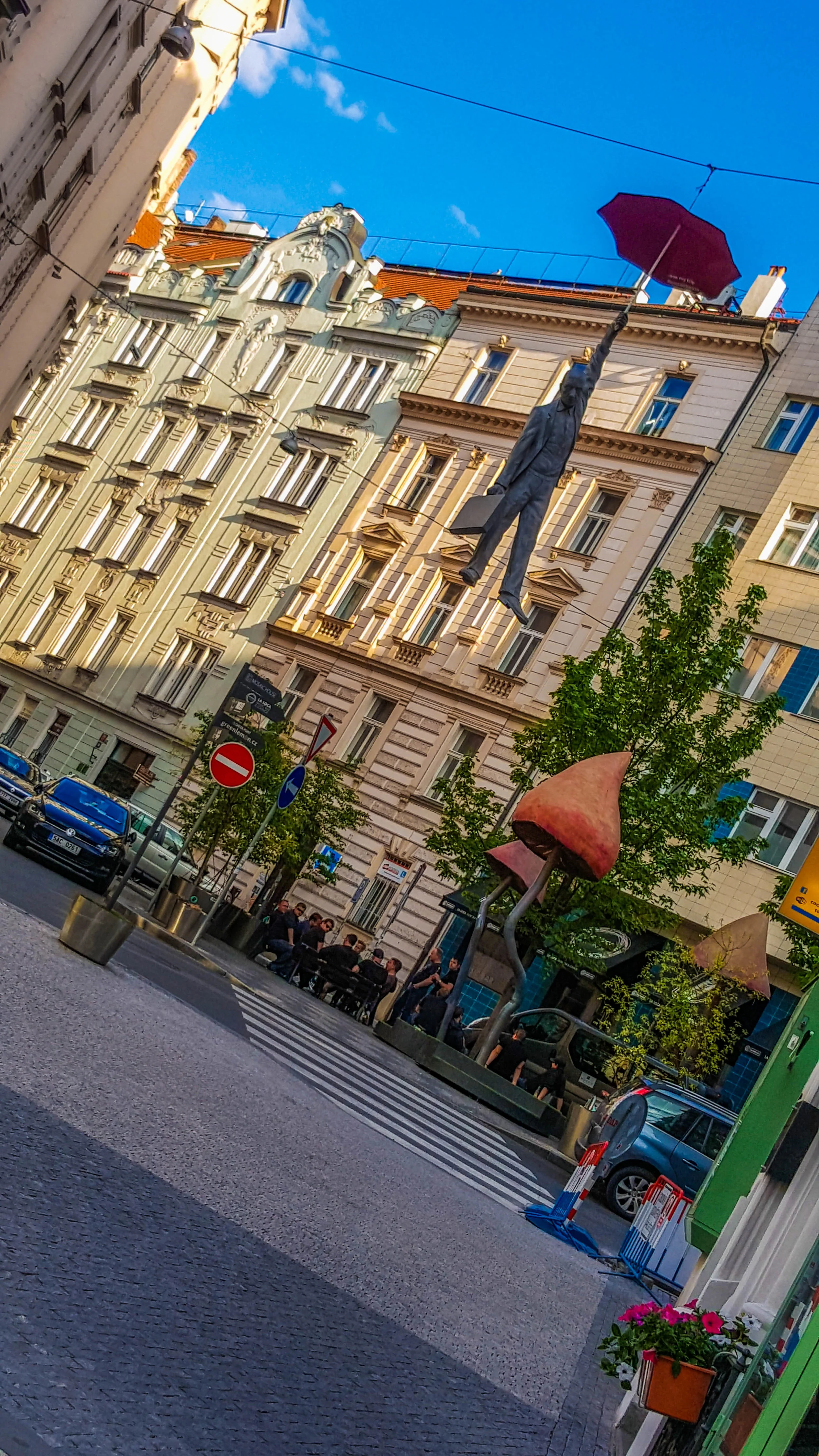 The hanging umbrella man. Random works of art are all around Prague