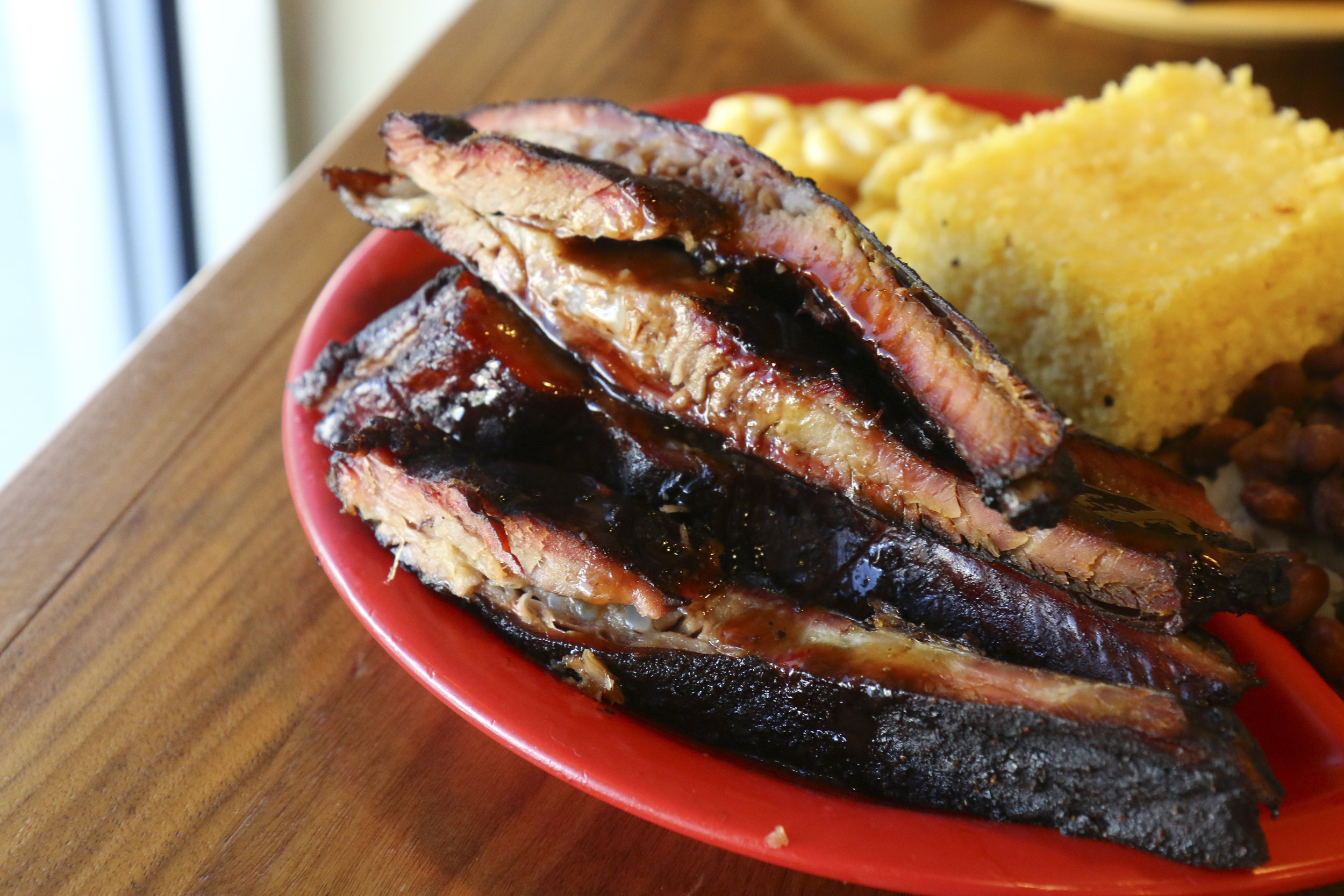 Satchel’s BBQ’s pitmaster gives a brief tutorial on how to trim a brisket before putting it on the smoker