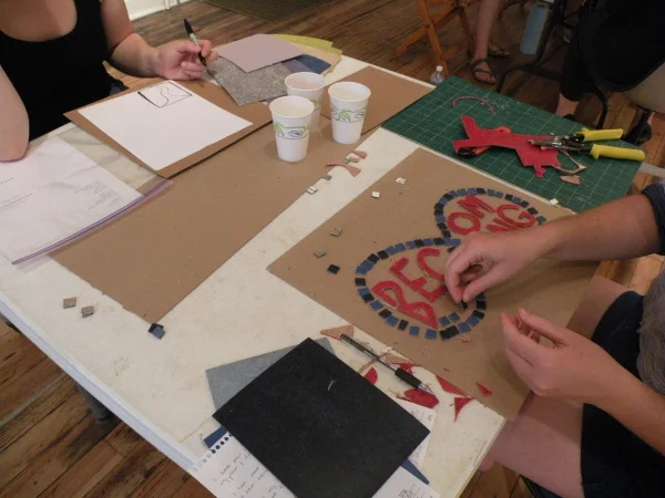 Close up of Lucy Clark’s tile, “Becoming.” Photo by Maura Pellettieri