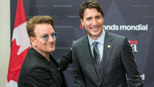 Photo: Prime Minister Justin Trudeau greets Bono September 2016. THE CANADIAN PRESS/Paul Chiasson