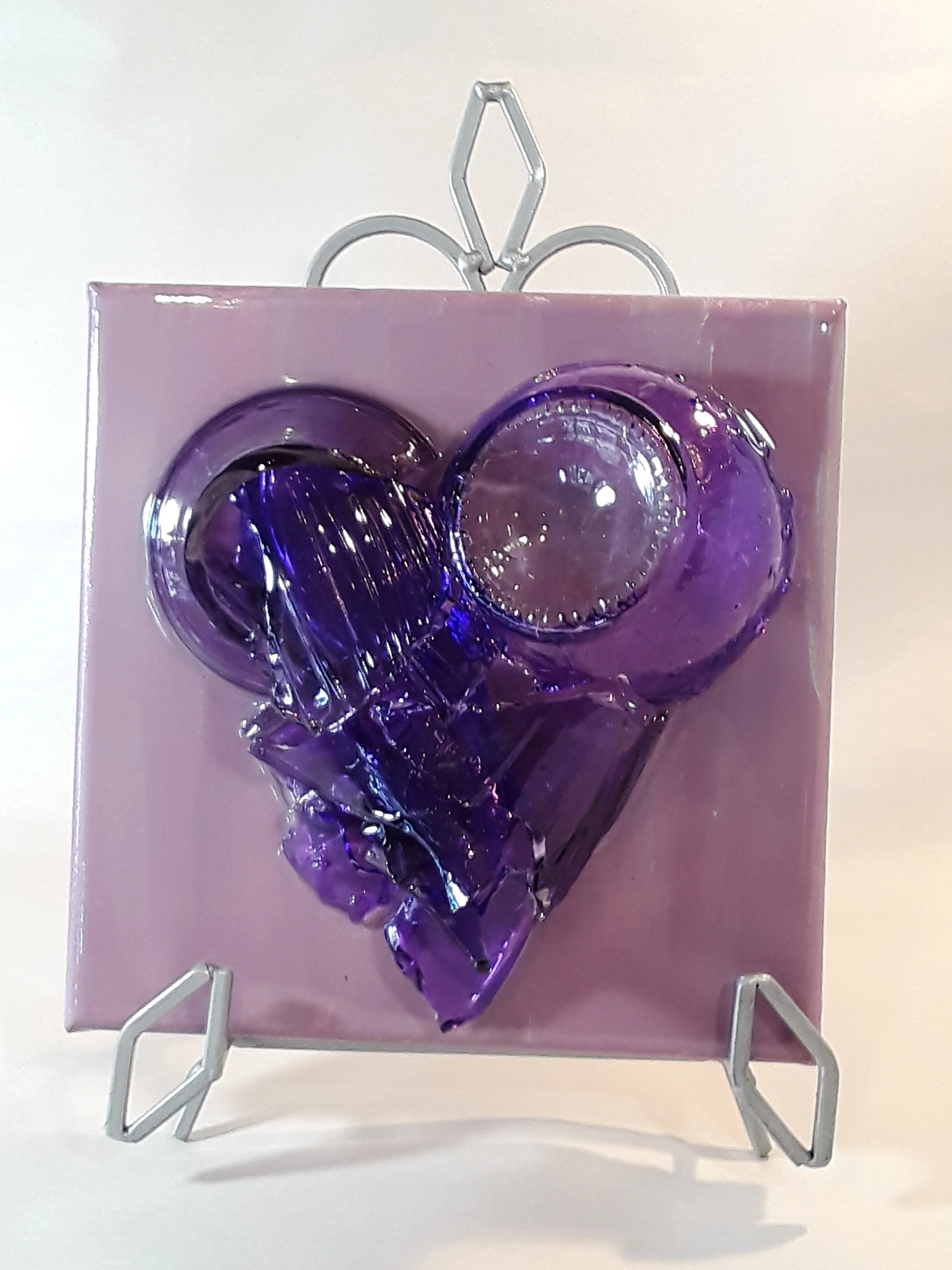 Purple heart on purple canvas