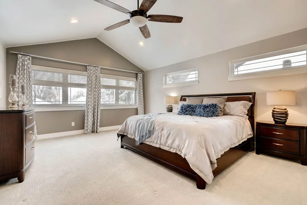 View of the vaulted upstairs master bedroom.