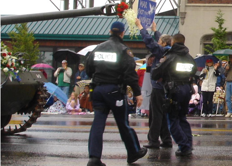 Bonnie Tinker being arrested. 