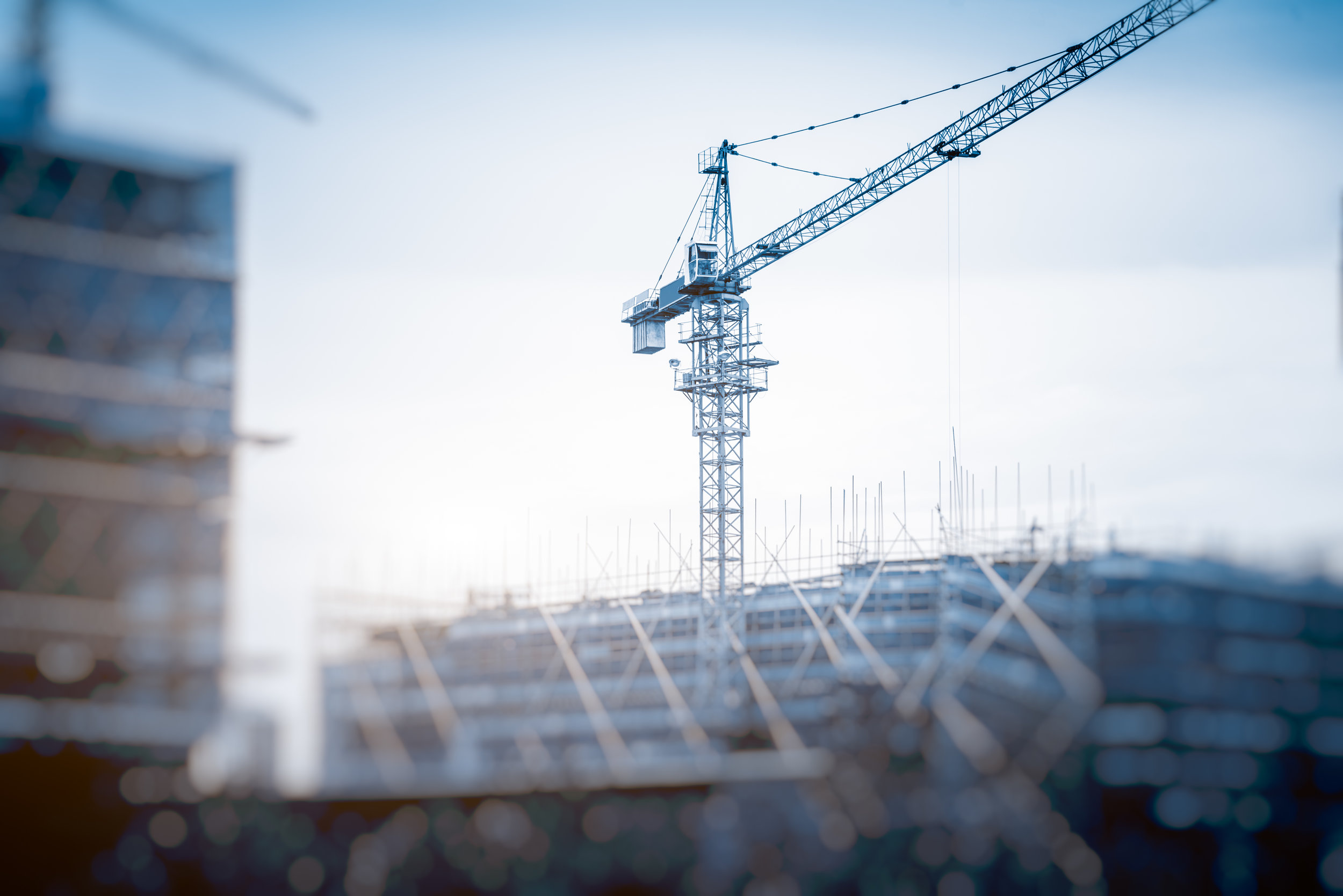 I17_Low-Angle-View-Of-Cranes-against-skyline-614130830_6016x4016.jpeg