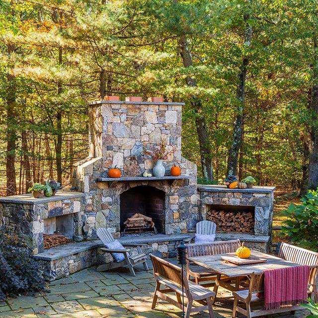 It&rsquo;s getting chilly around here!  Having a fireplace on your patio keeps the party warm year round. (📸 by bdw_photography) #newenglandlandscapes #fieldstone #outdoorfireplace🔥 #designandbuild #autumnlandscape🍁🍂🌿 #Medfield