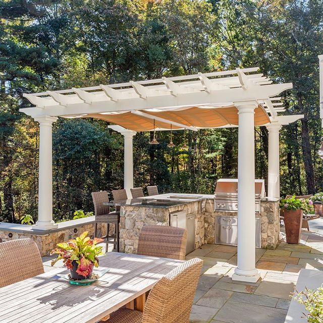 Adding entertaining space to your yard adds life (and often value) to your property! We can help you create something special. 🍁🥂 (📸 by @bdw_photography bdw_photography) #newenglandlandscaping #makeitbeautiful #pergola #bluestone #frontgate #outdo