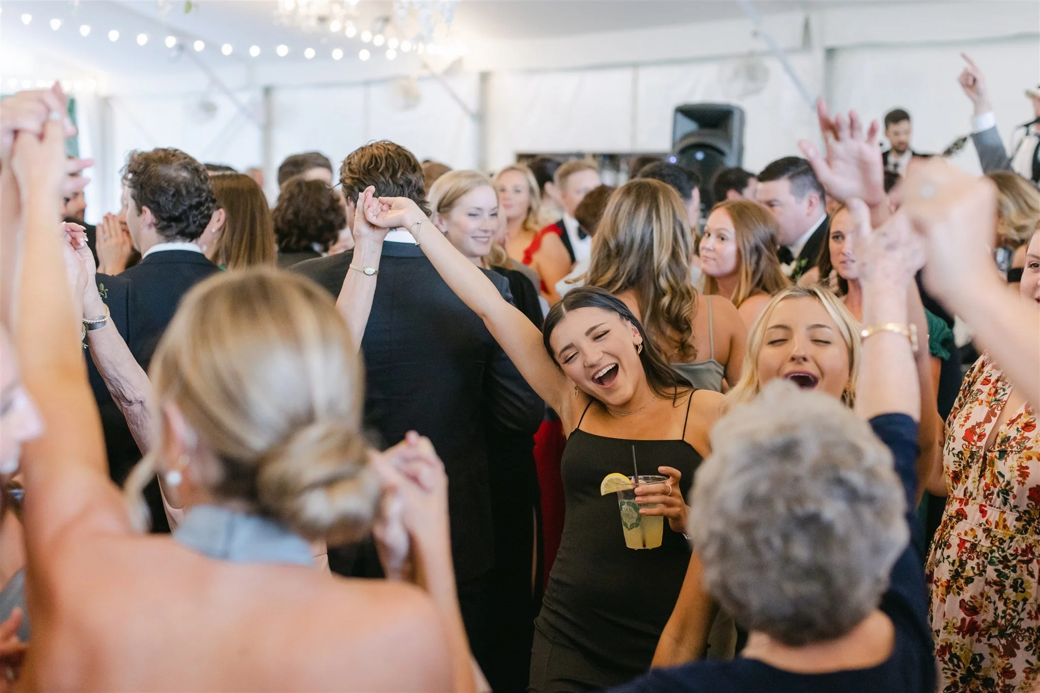 packed dance floor at a swooners wedding