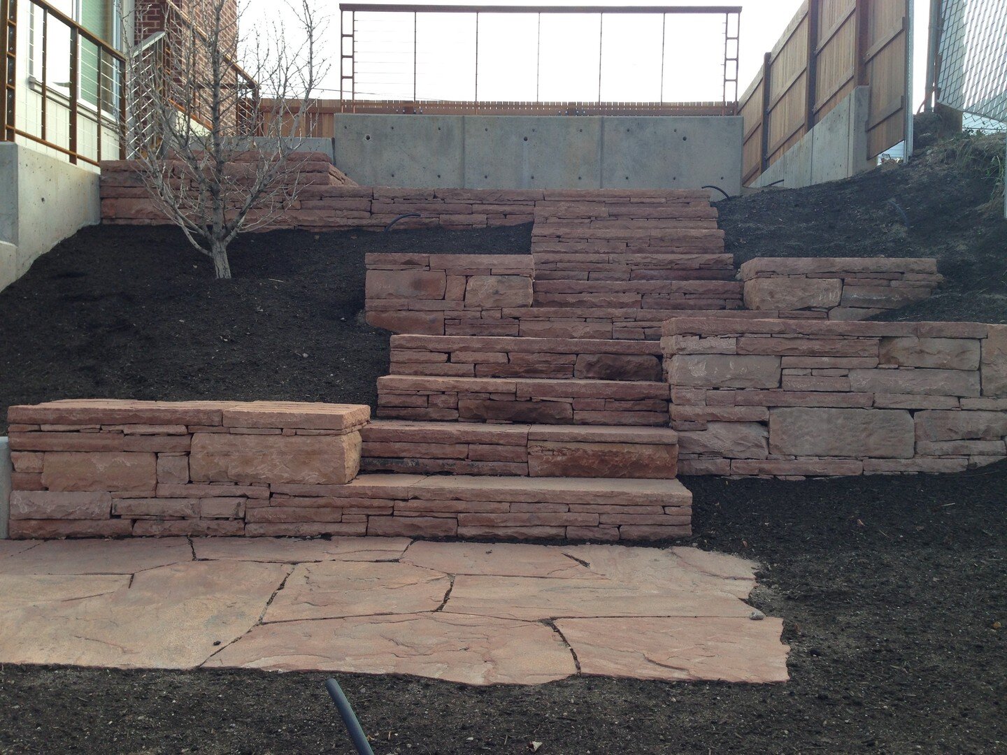 Our talented team installed this dry stack stone wall and steps to turn our client's steeply sloped yard into a functional and beautiful outdoor space. 

#landscapedesign #landscape #drystack #wall #stonesteps #hardscape #stonecraft #slopedgarden #pl