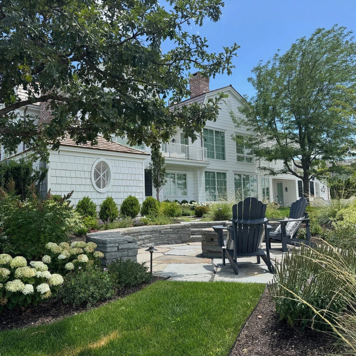 The perfect place to unwind under the open sky.

#landscapedesign #landscape #firepit #firefeature #drystack #stonecraft #hardscape #utah #hydrangea
