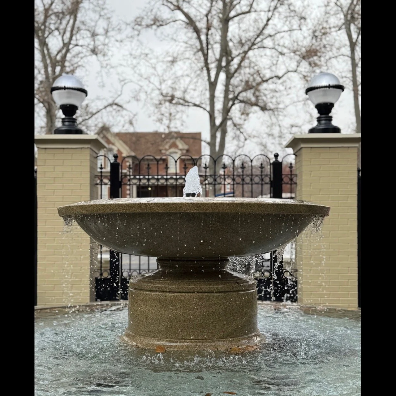 This impressive fountain was recently installed at the historic Walker-McCarthey Mansion in downtown Salt Lake City. Designer @simschwobe took inspiration for the pillars and light fixtures from a vintage photograph of one of the home's original occu