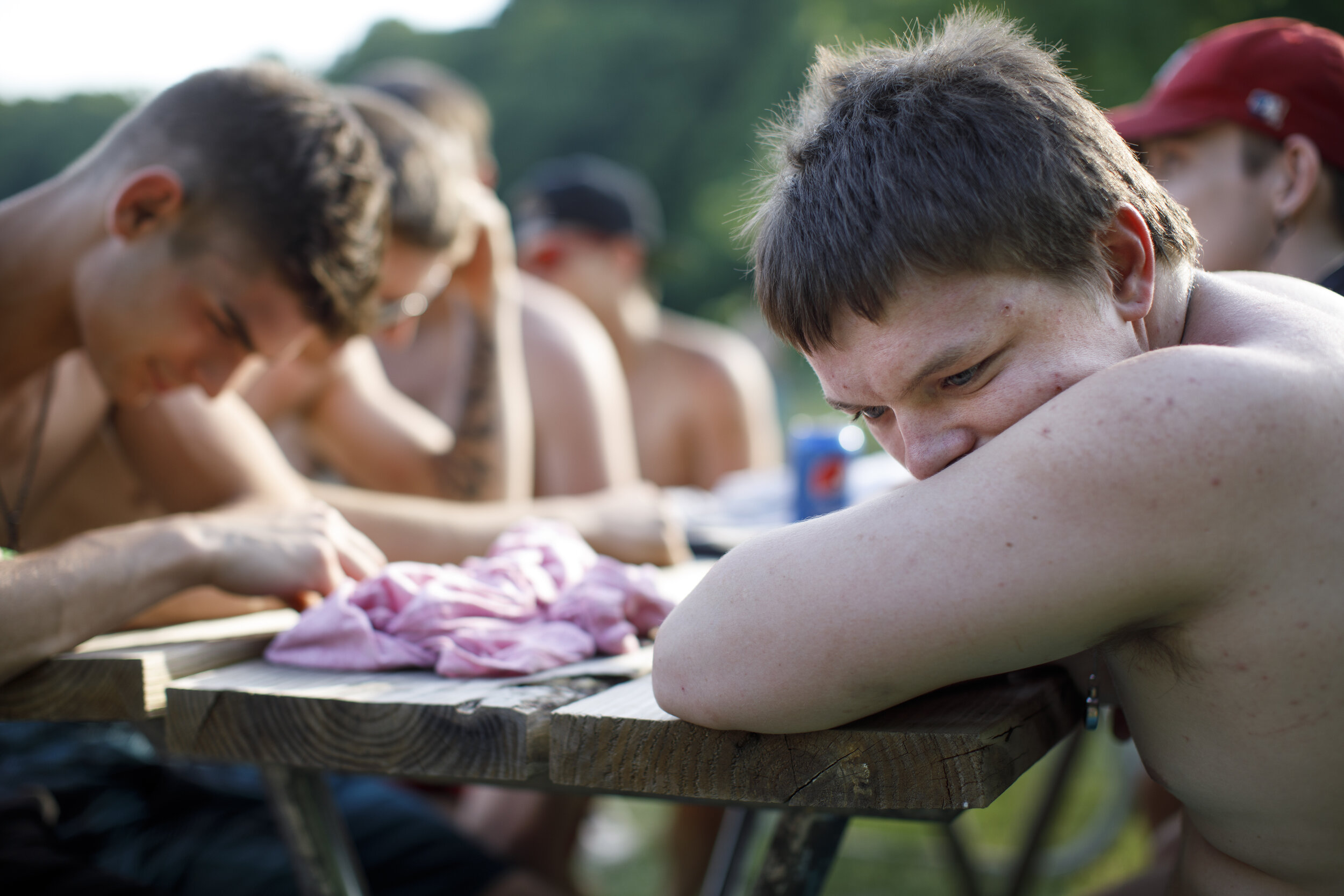  Reuben takes a moment for himself after celebrating his graduation with friends and family at Burr Oak Lake in Glouster, Ohio, on May 25, 2021. “It’s really hard to be proud of myself because I don’t feel like I made myself happy… I have experienced