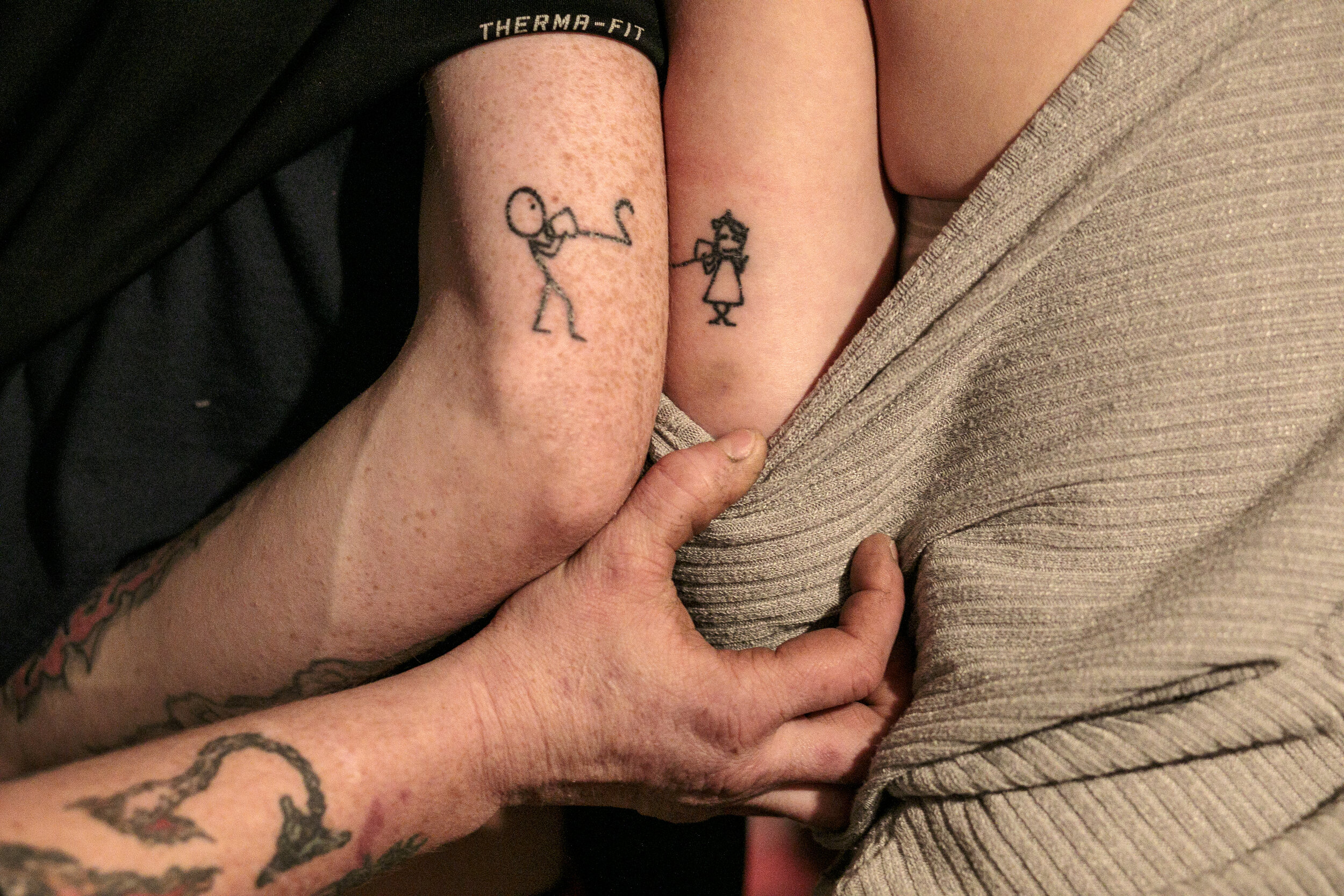  Staci reveals Leslie and John’s “mother and son” tattoo of a string telephone that connects when together. 