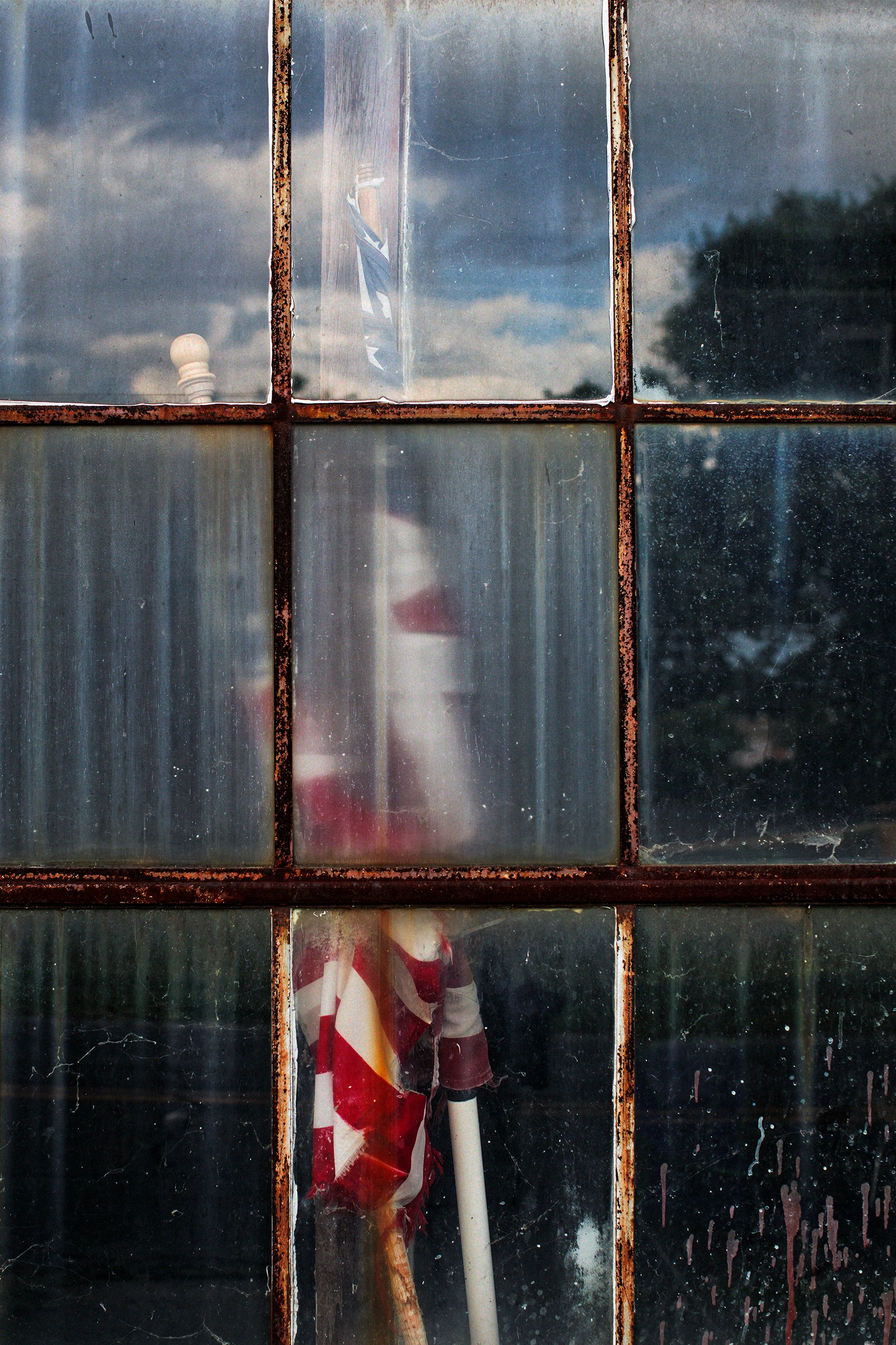  American Flags rest inside the shuttered Phillips Packing Company in Cambridge. The plant was once the largest employer in Dorchester county. Today the property is the focus of a restoration and revitalization effort by the Eastern Shore Land Conser