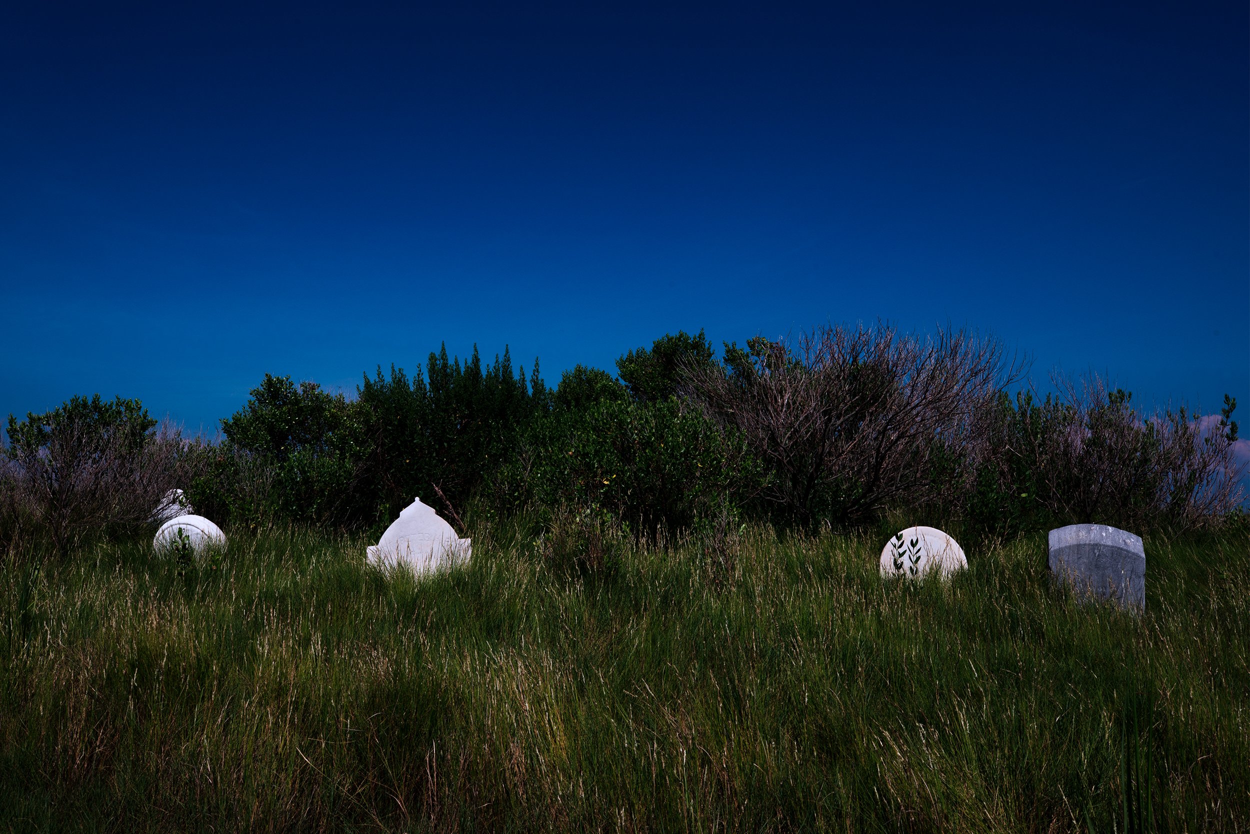  The graveyard of Holland Island Methodist Church is one of the last visible remains of the community that once inhabited the island. Holland Island has been sinking into the Chesapeake as the landmass is eroded away by heavy winds, seas, and storms.