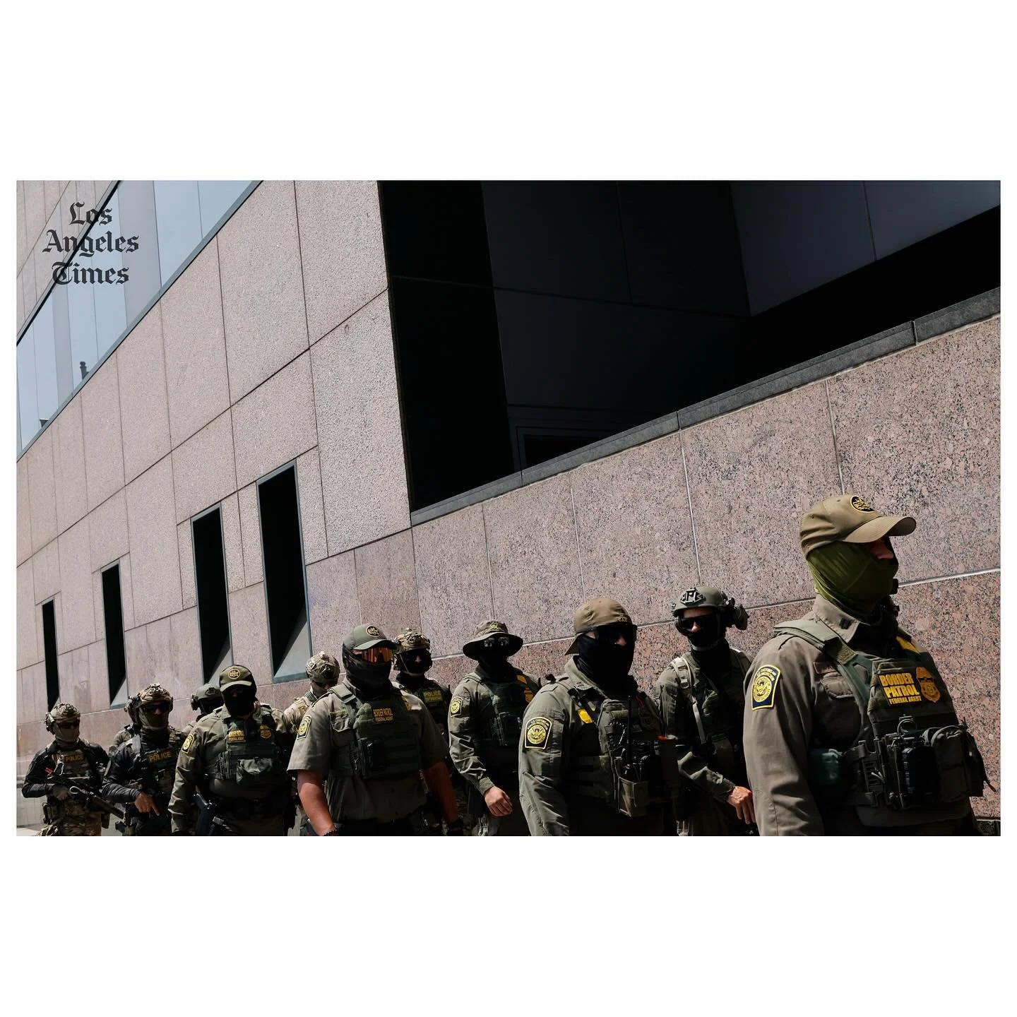 Gregory Bovino, Chief Patrol Agent of the El Centro Sector and Commander-Operation At Large CA, marches with federal agents to the Edward R. Roybal Federal Building after US Border Patrol agents produced a show of force outside the Japanese American 
