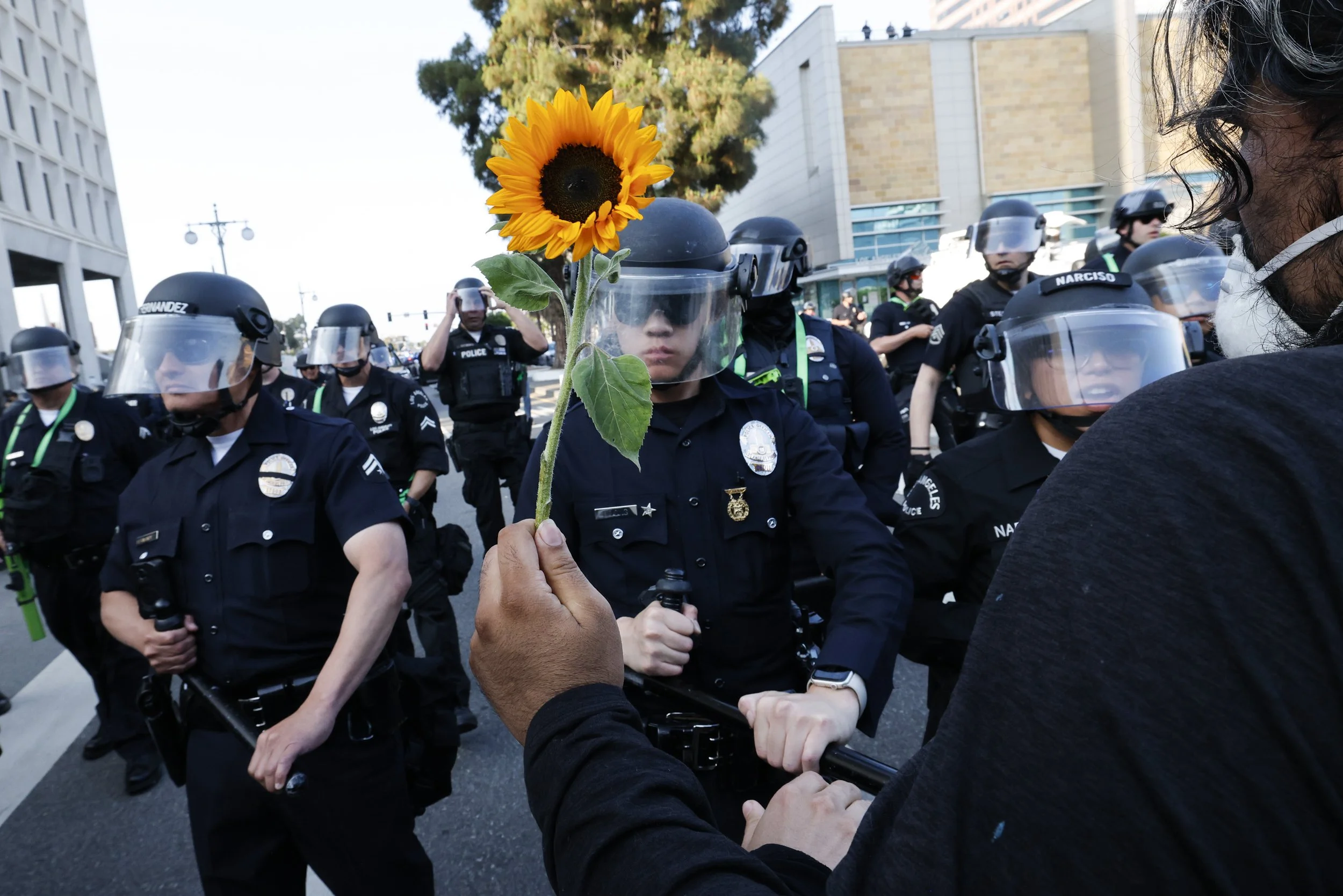  os Angeles Police officers push back anti-ICE protesters down Los Angeles St. away from the Federal Building on Monday, June 9, 2025 in Los Angeles, Calif. 