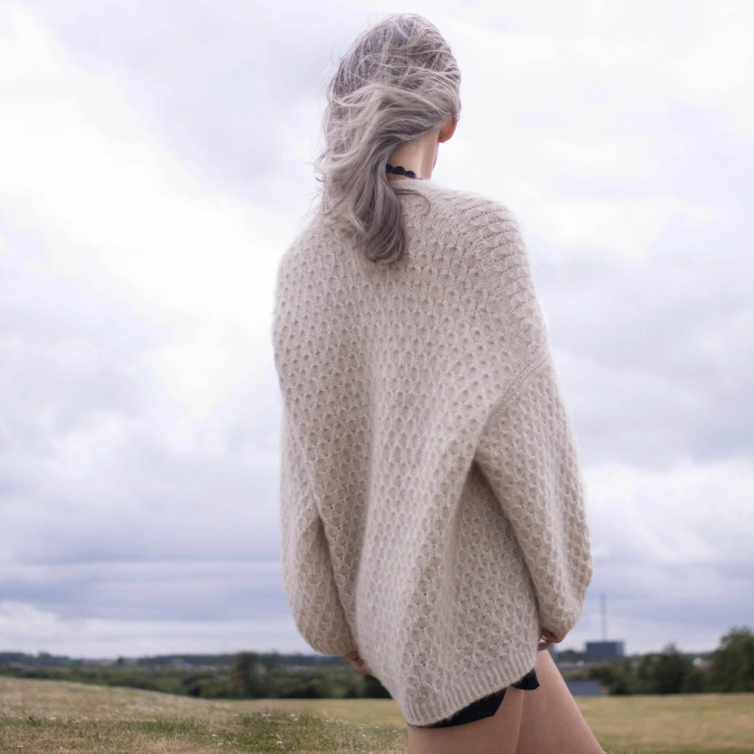 Cardi V-neck, English. The sweater is 