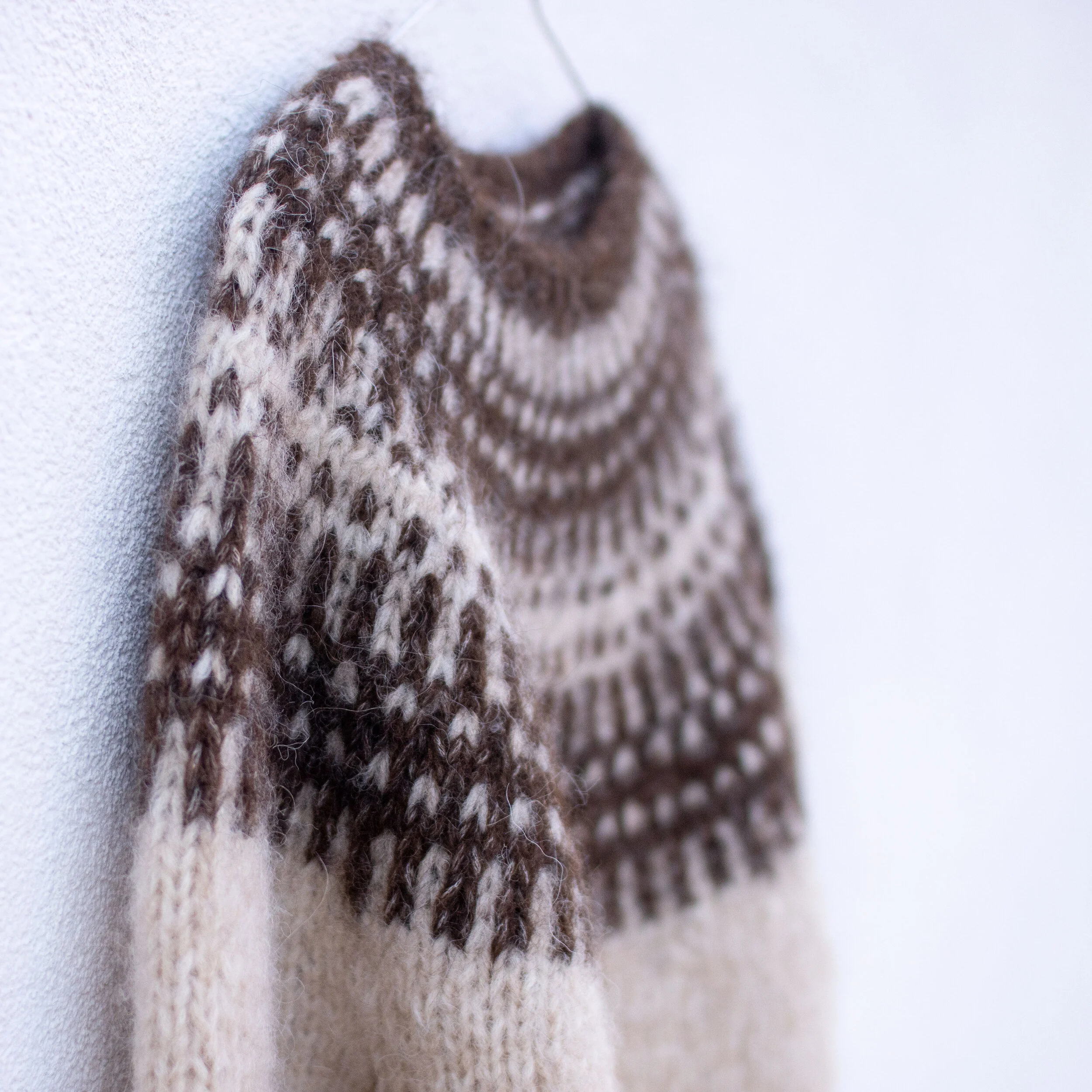 BADGER SWEATER is a soft and warm 