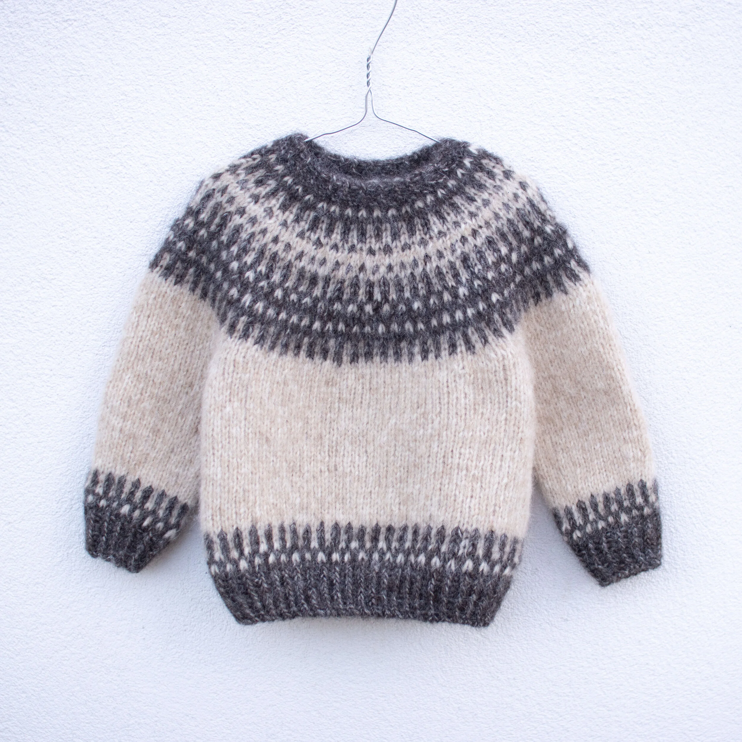 BADGER SWEATER is a soft and warm 
