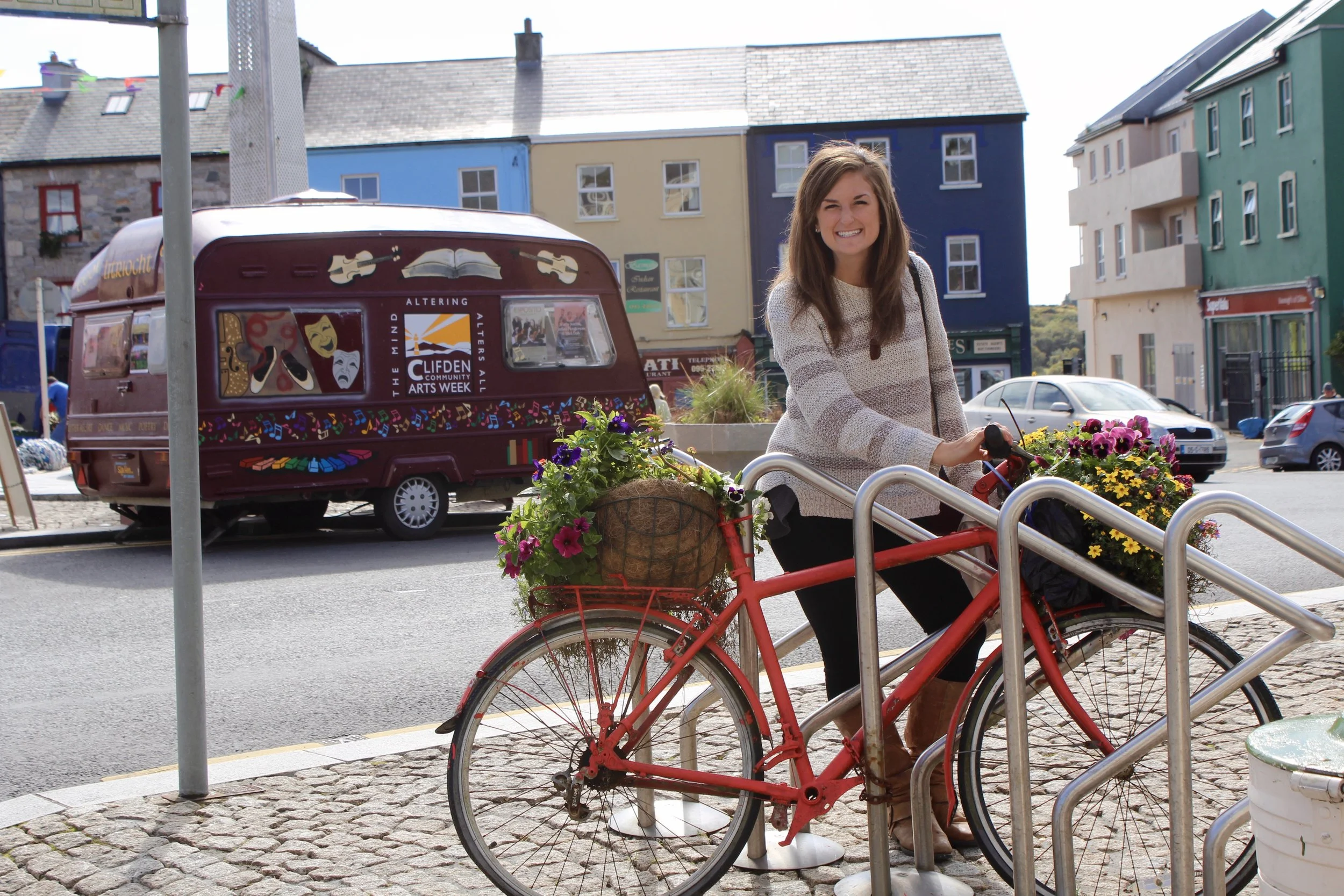 Me and a bike with flower-filled baskets in Clifden, Connemara. When it’s an option, I much prefer biking or walking to motorized vehicles.