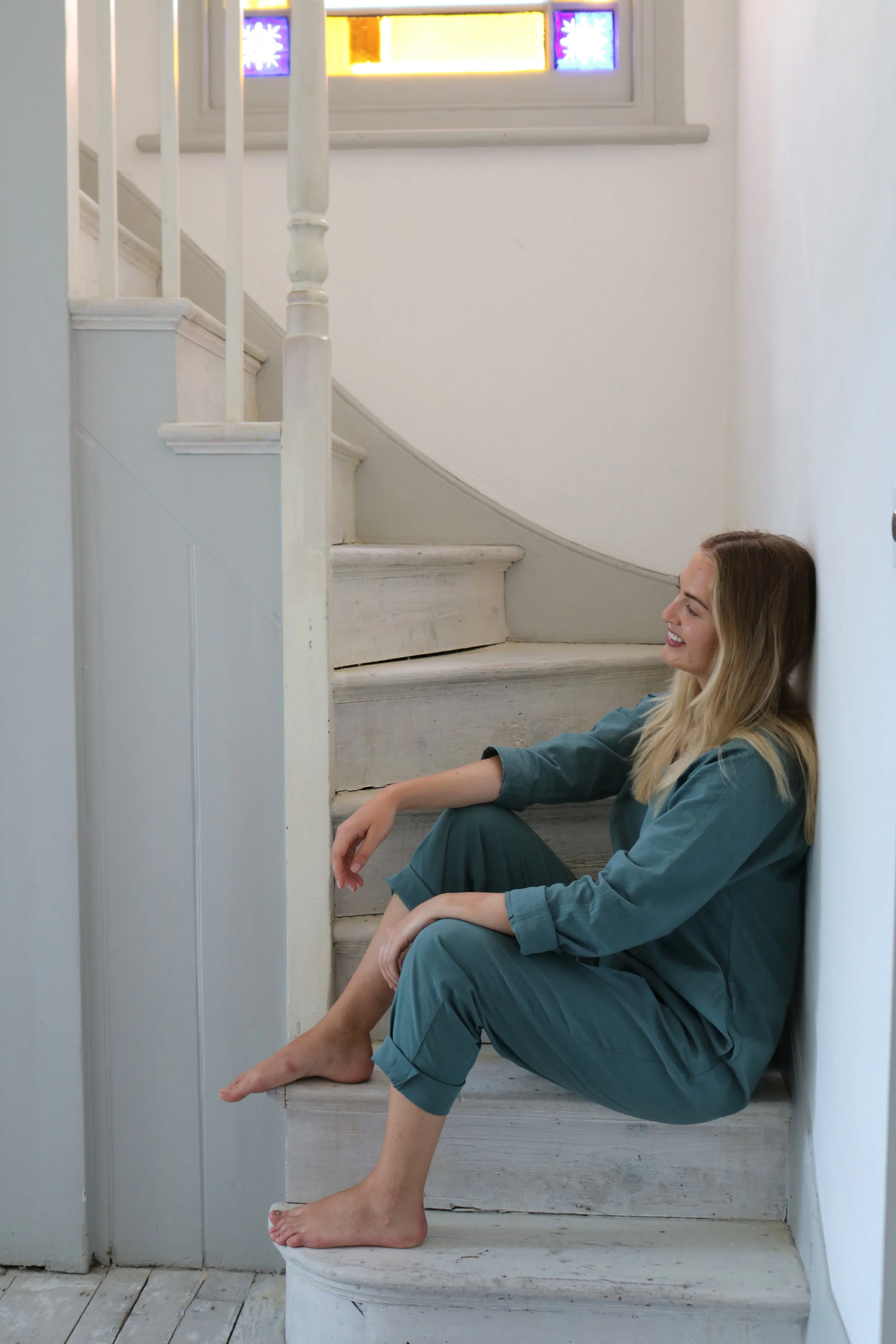 Blonde girl sitting on stairs | London Lifestyle Workshop | Photograph