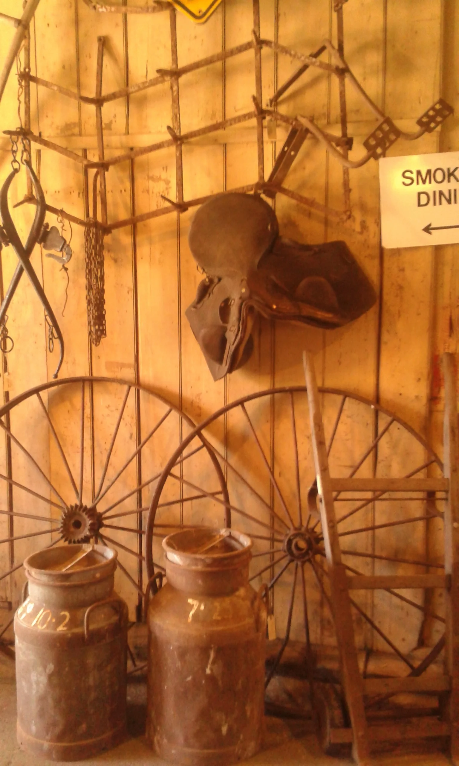 Countryfinds : C.1940's cream cans, steel waggon wheels, horse haynes , rustic chains and a cool sack barrow.
