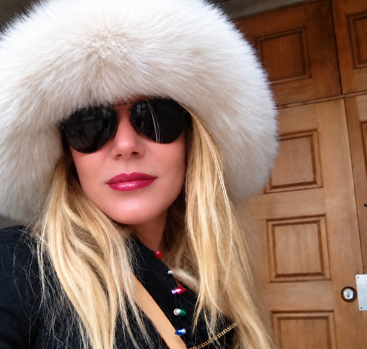 Glamorous Winter Hat Selfie at the Door (1).png
