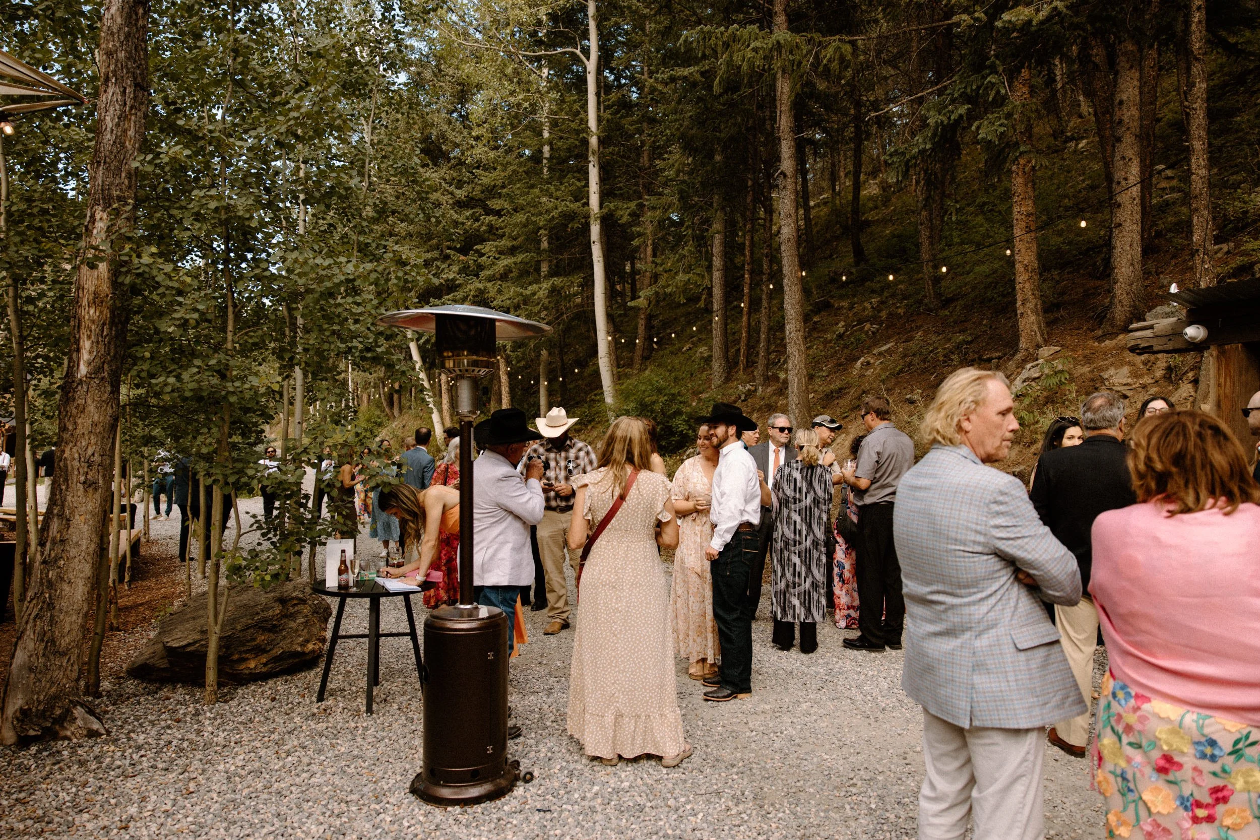 Wedding guests mingling at a wedding at Blackstone Rivers Ranch