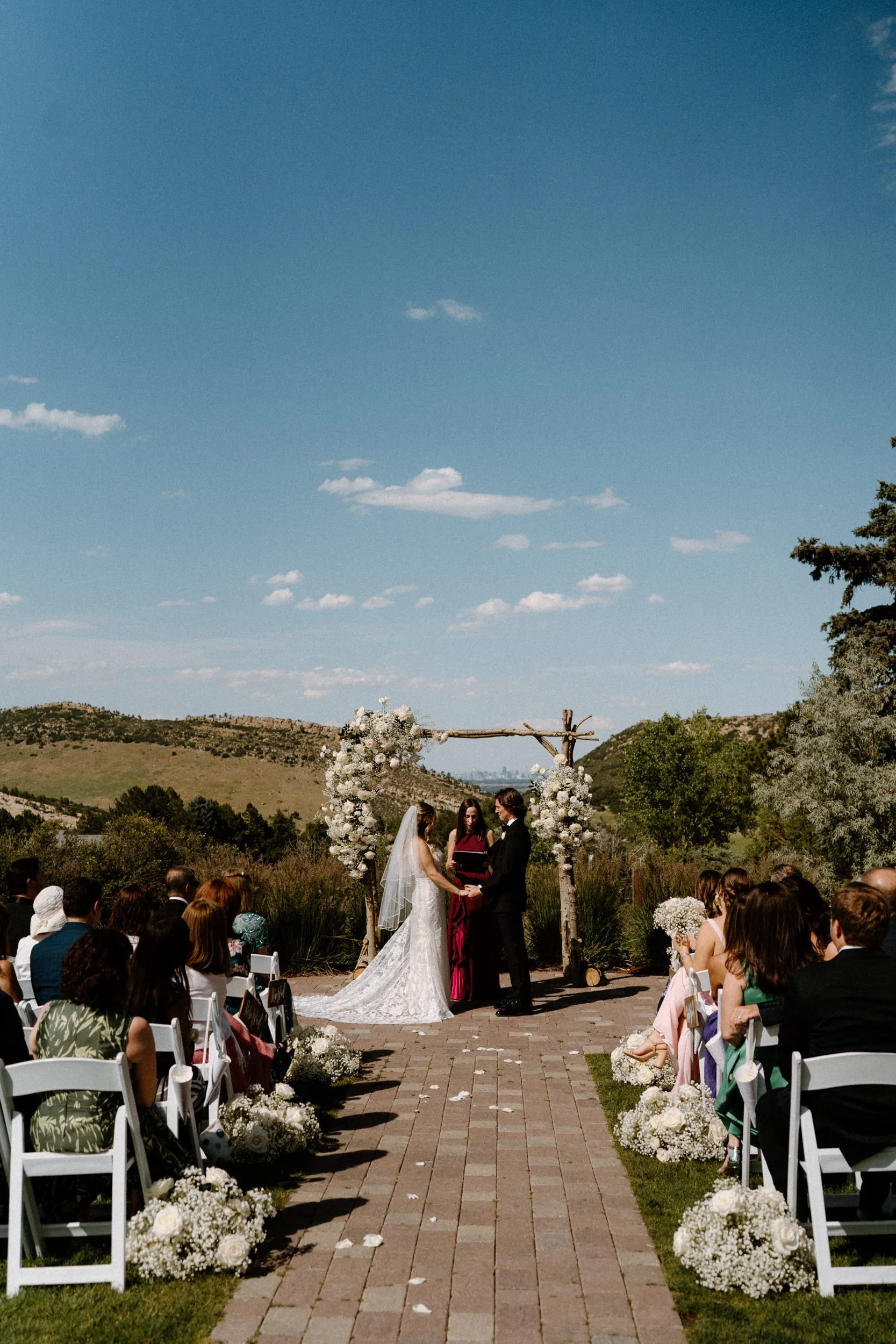 Bride and groom standing at the alter on wedding day at The Manor House