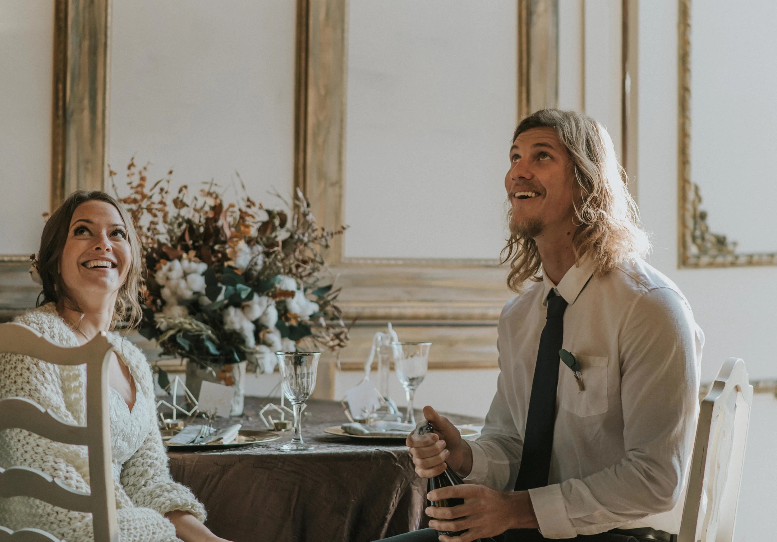  Toasts in the Chandelier Barn at Lionsgate Event Center. Colorado wedding photographer. 