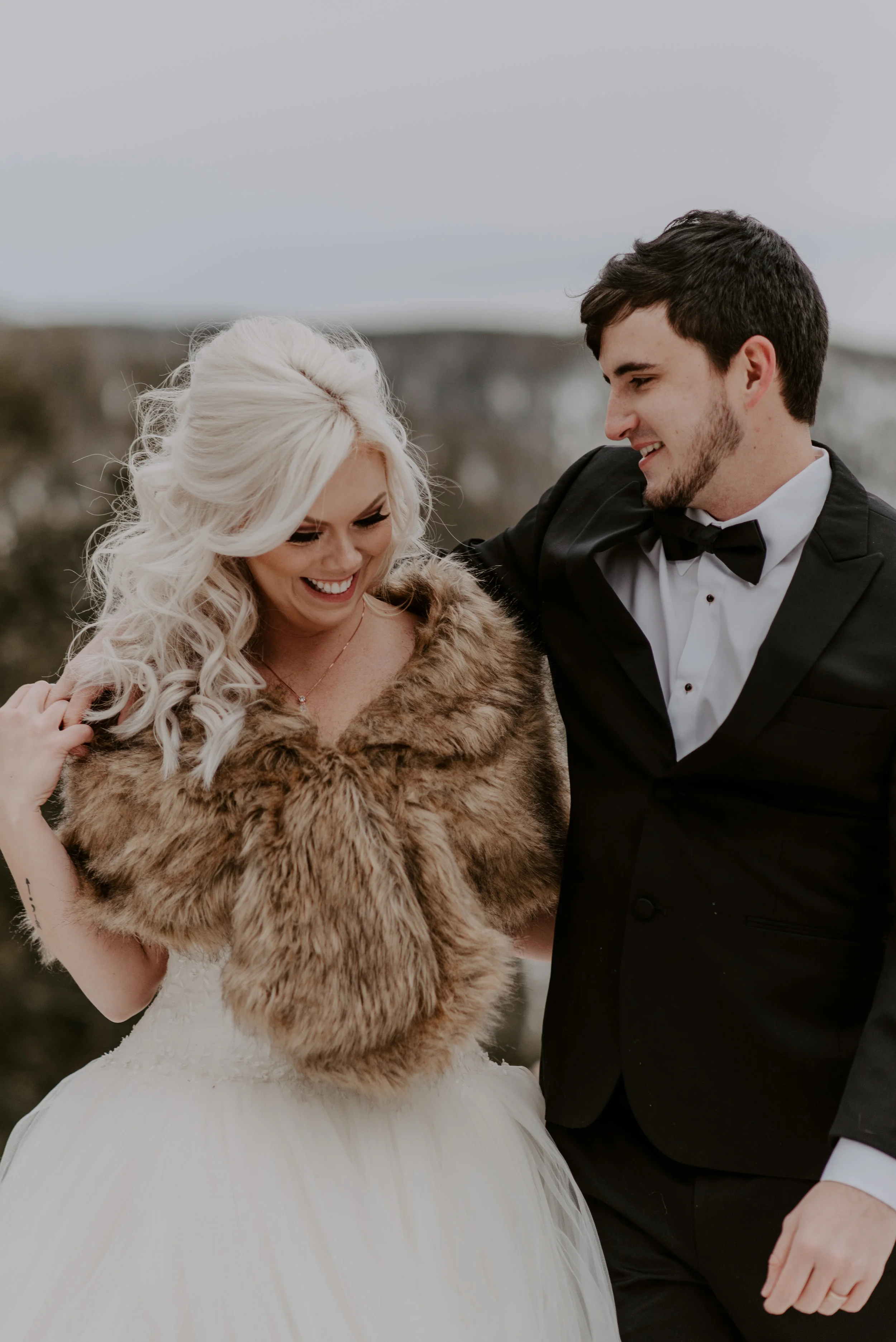  Photos of bride & groom at a winter elopement at Sapphire Point taken by a Colorado wedding photographer. 