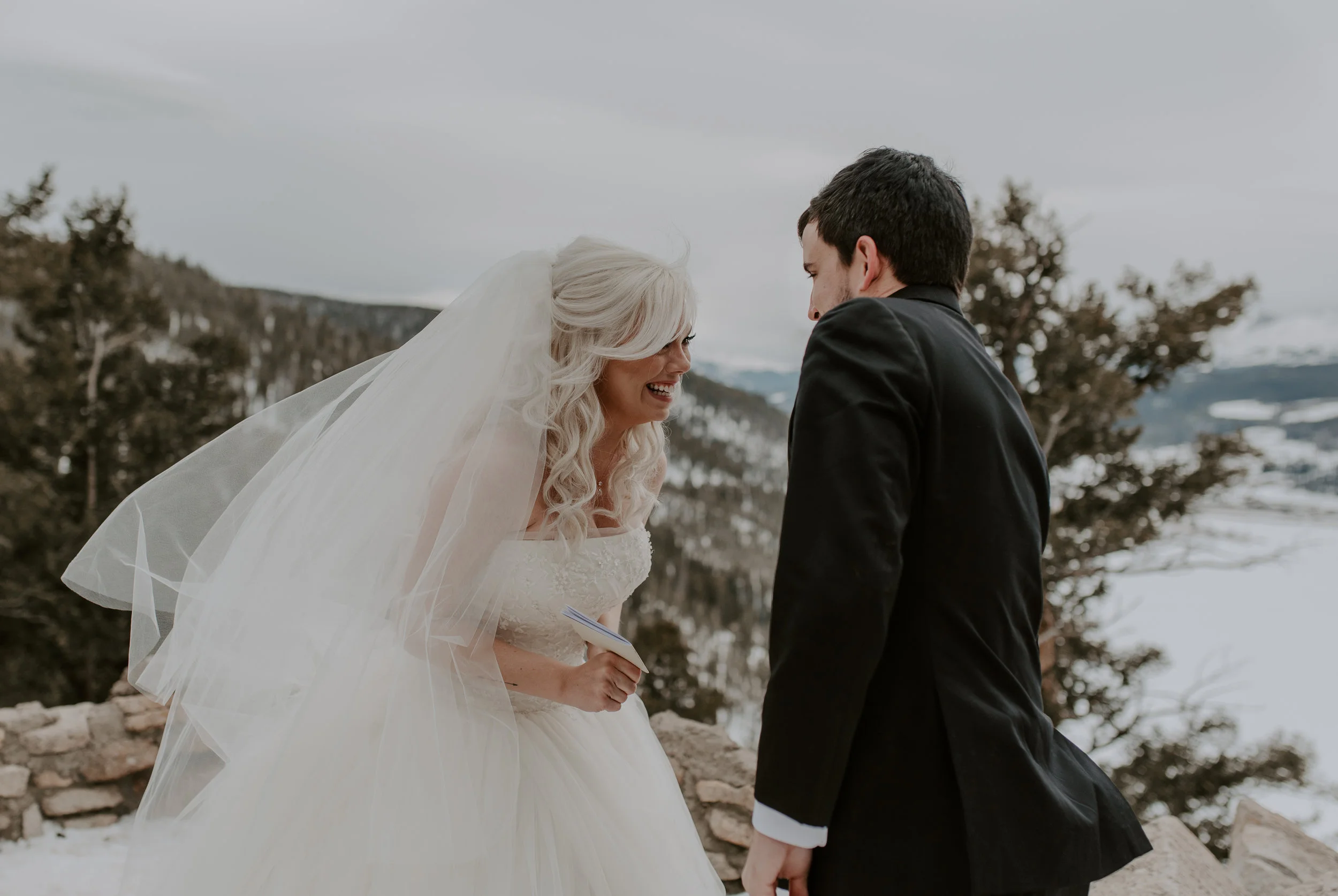  Ceremony at a Sapphire Point winter elopement in Dillon, Colorado. Colorado adventure elopement and wedding photographer. 