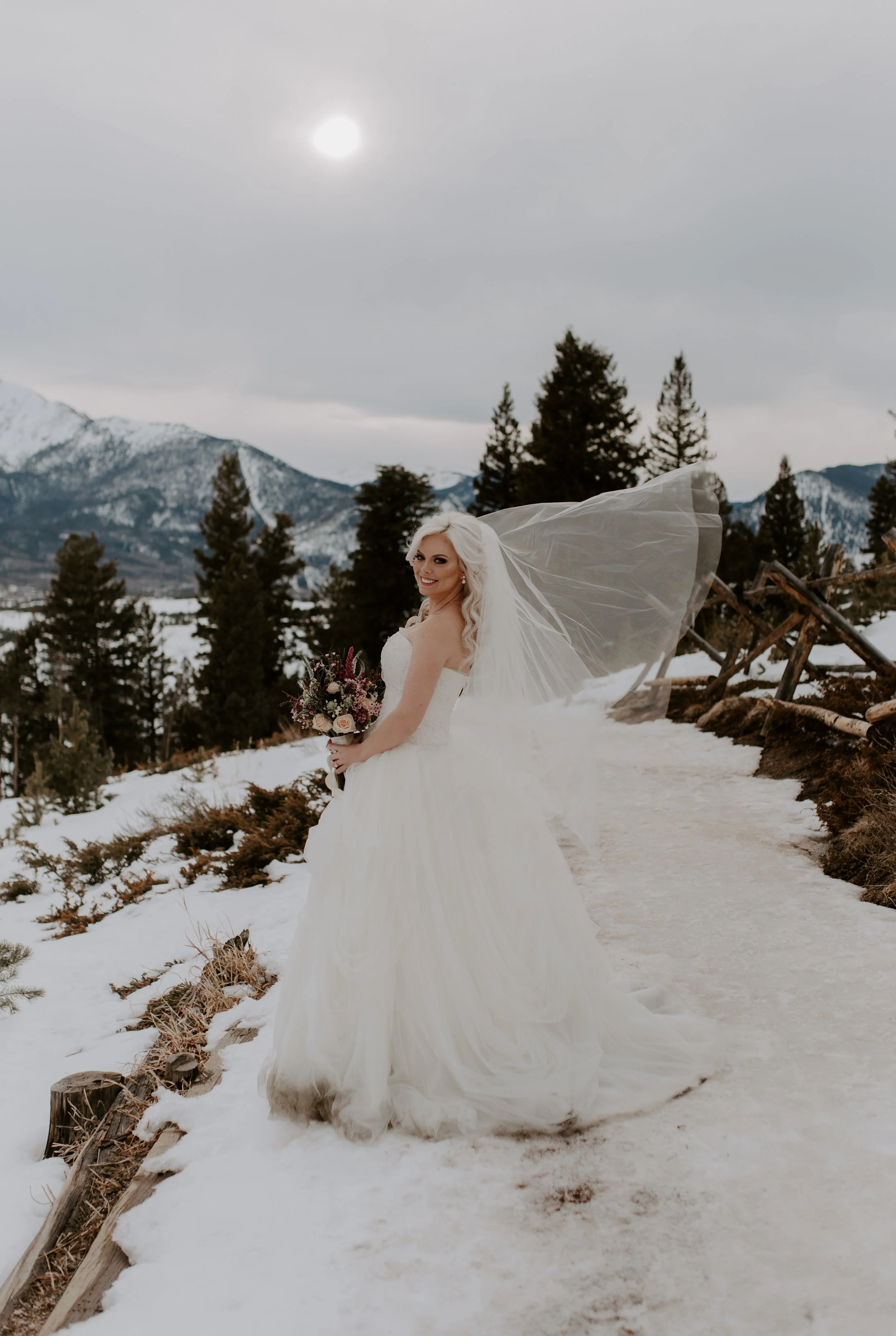  Bridal portraits by a Colorado wedding photographer at a Sapphire Point elopement in Dillon, Colorado. 