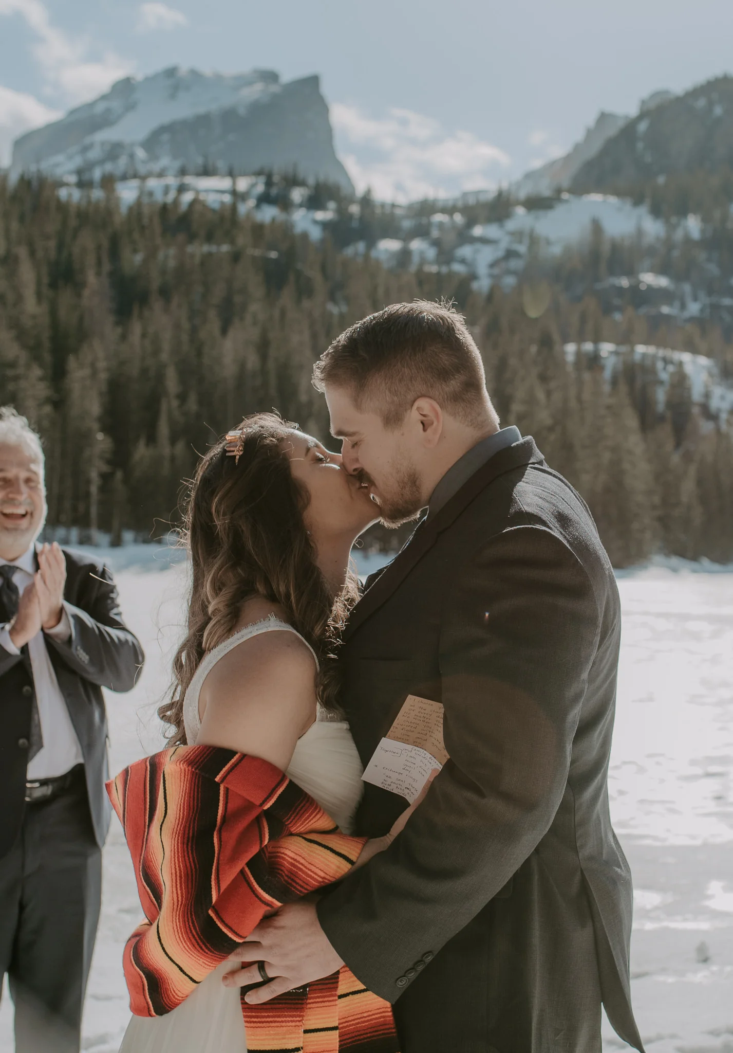  First kiss at this Bear Lake elopement in Rocky Mountain National Park 