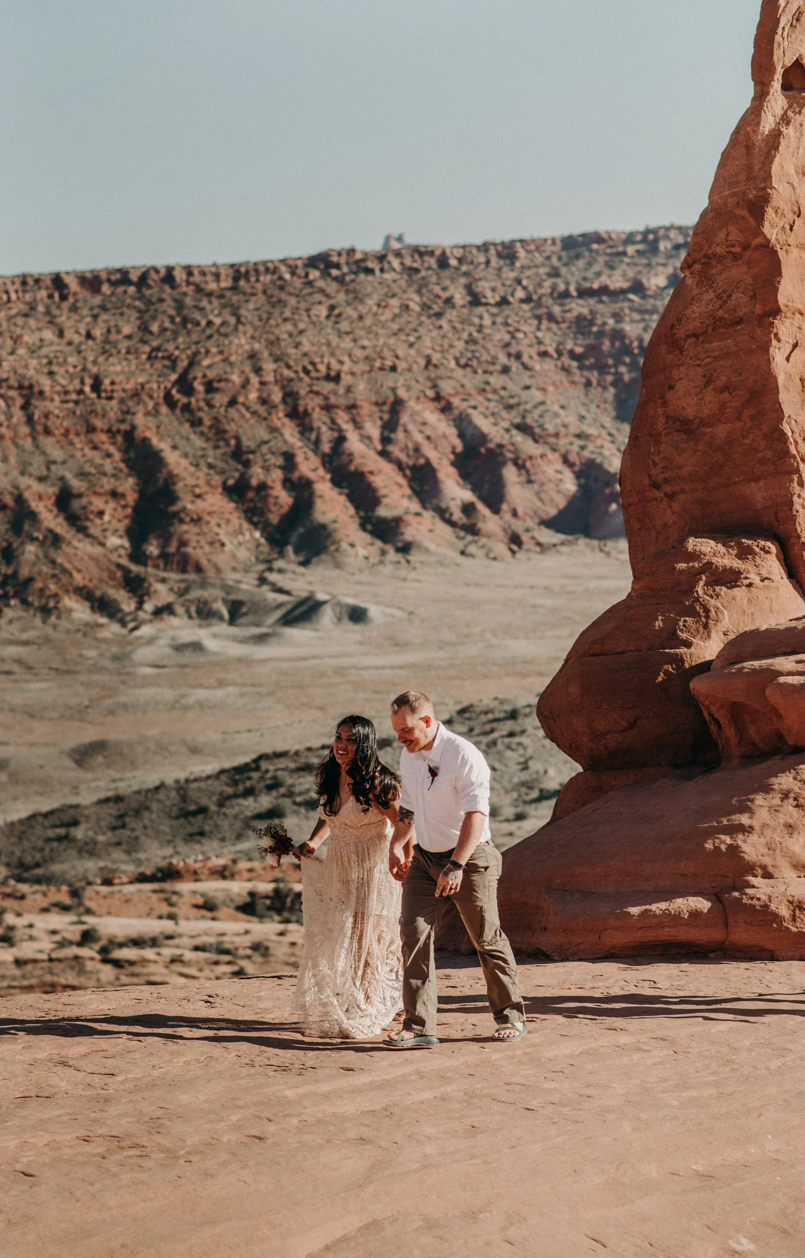  Adventure elopement at Arches National Park. Moab elopement photographer. 