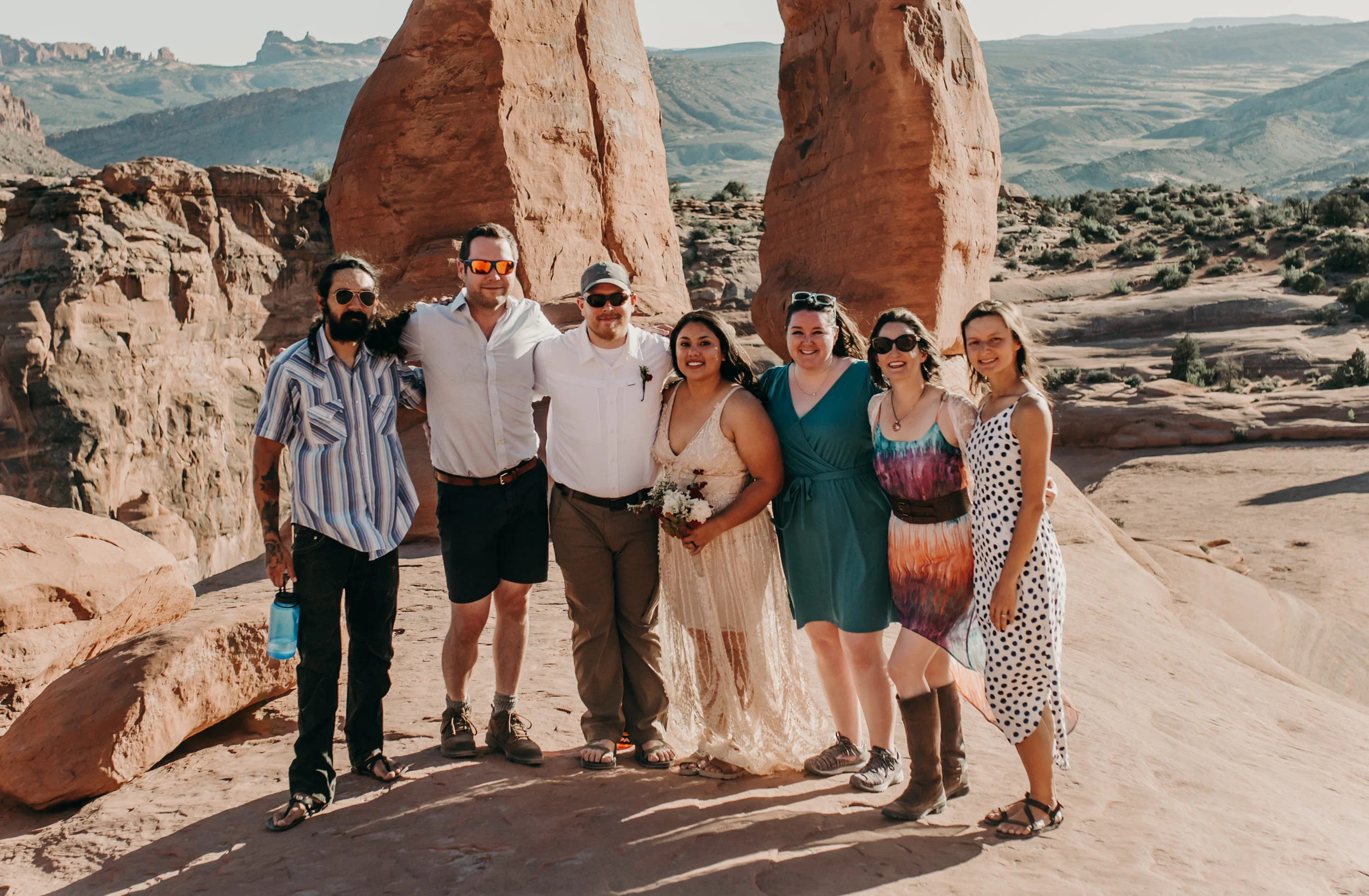  Delicate Arch adventure elopement. Moab wedding photographer. 