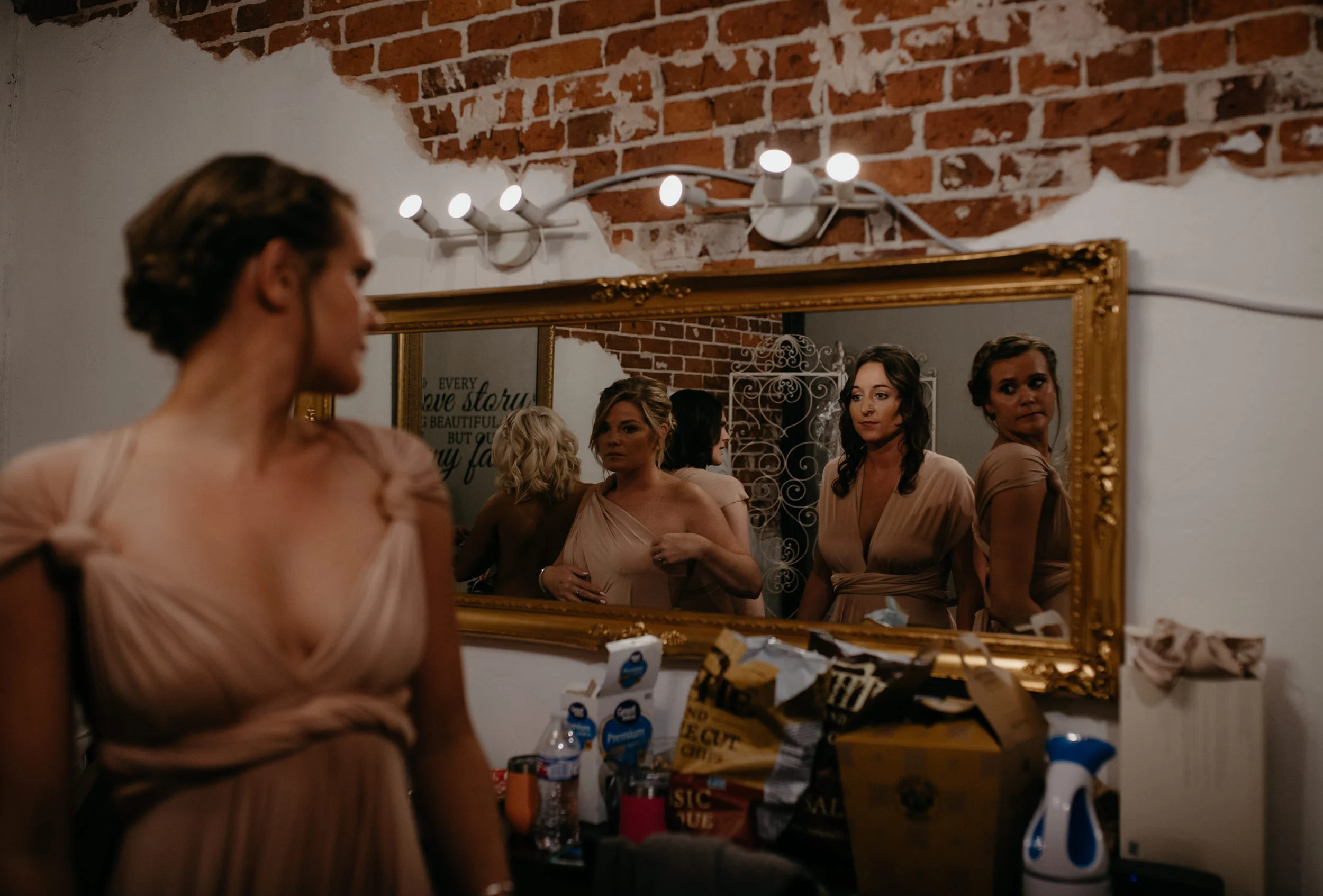  Moss Denver wedding getting ready. Bridesmaids getting ready before ceremony at Moss. 