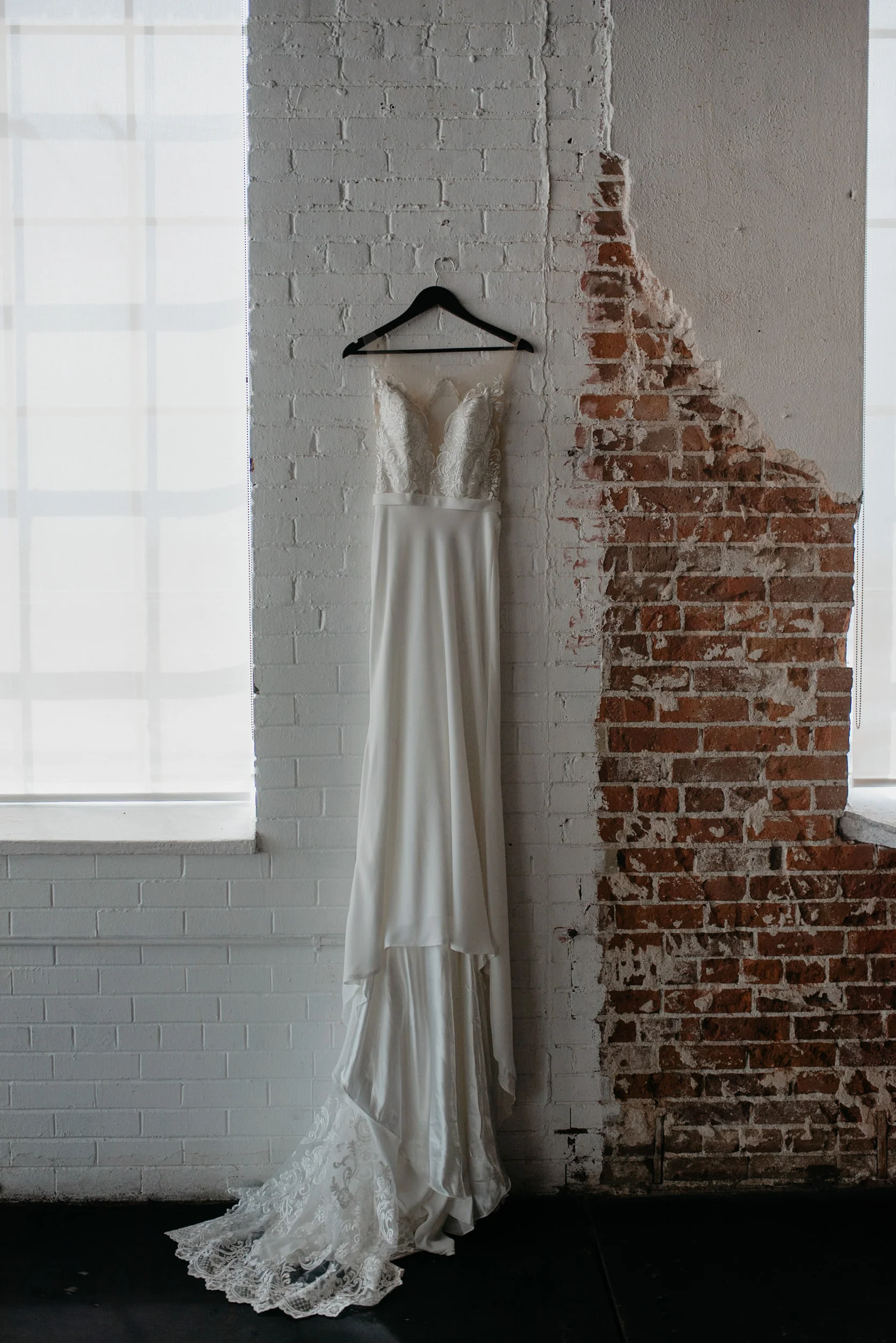  Downtown Denver, Colorado wedding at Moss. Colorado wedding photographer. Photo of dress at Moss. 