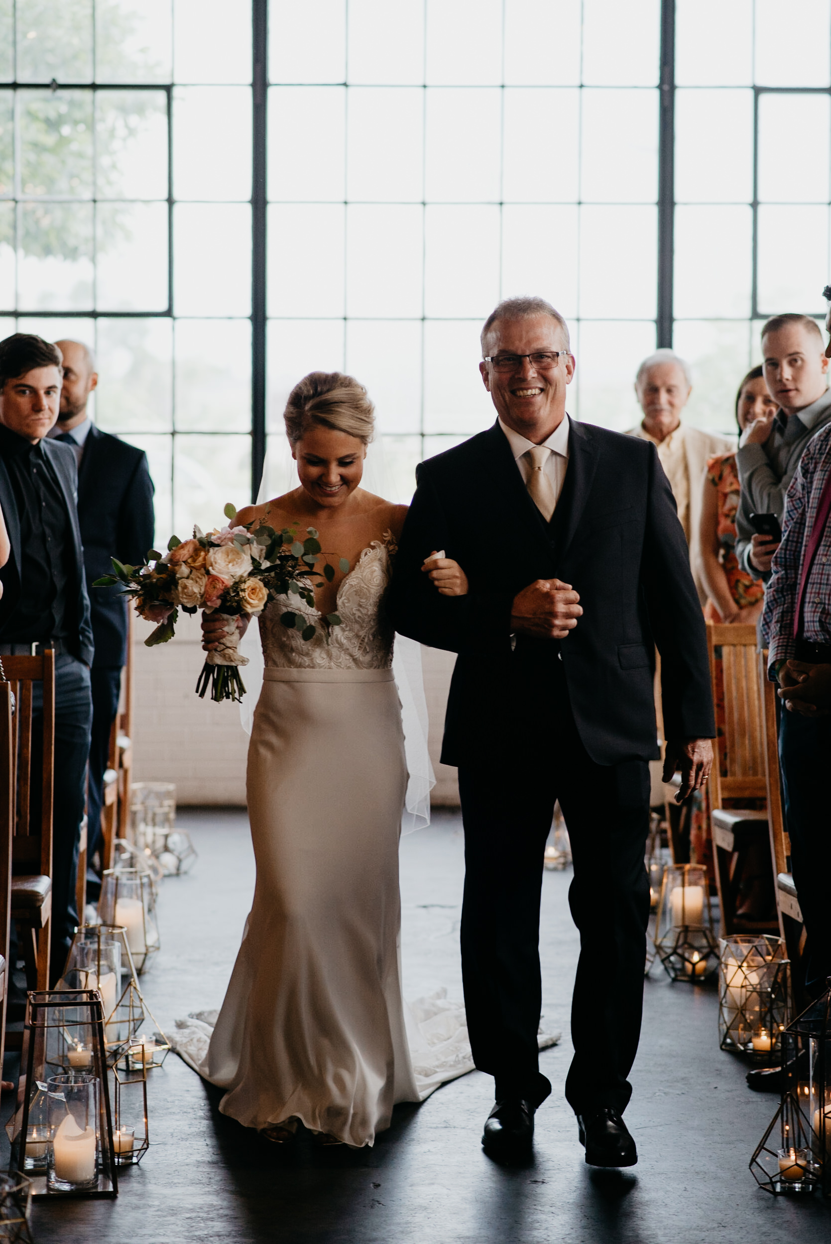 Bride and dad walking down the isle at Moss Denver wedding. Colorado wedding photographer. 