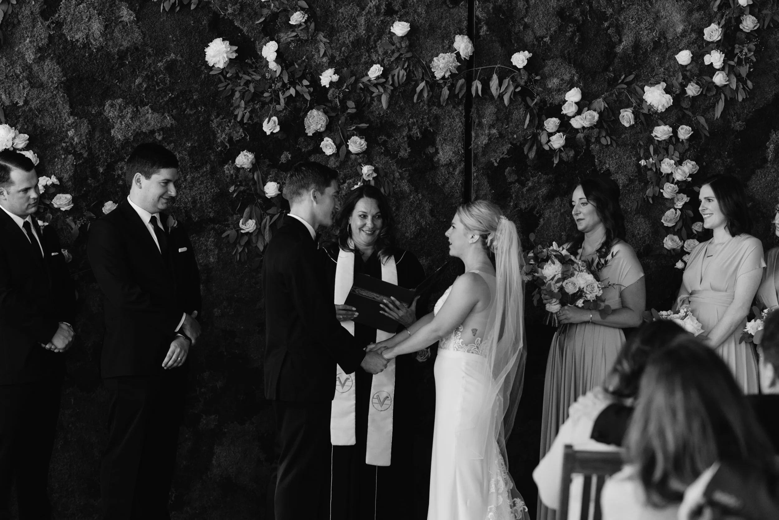  Bride and groom with officiant at Denver Moss wedding. 