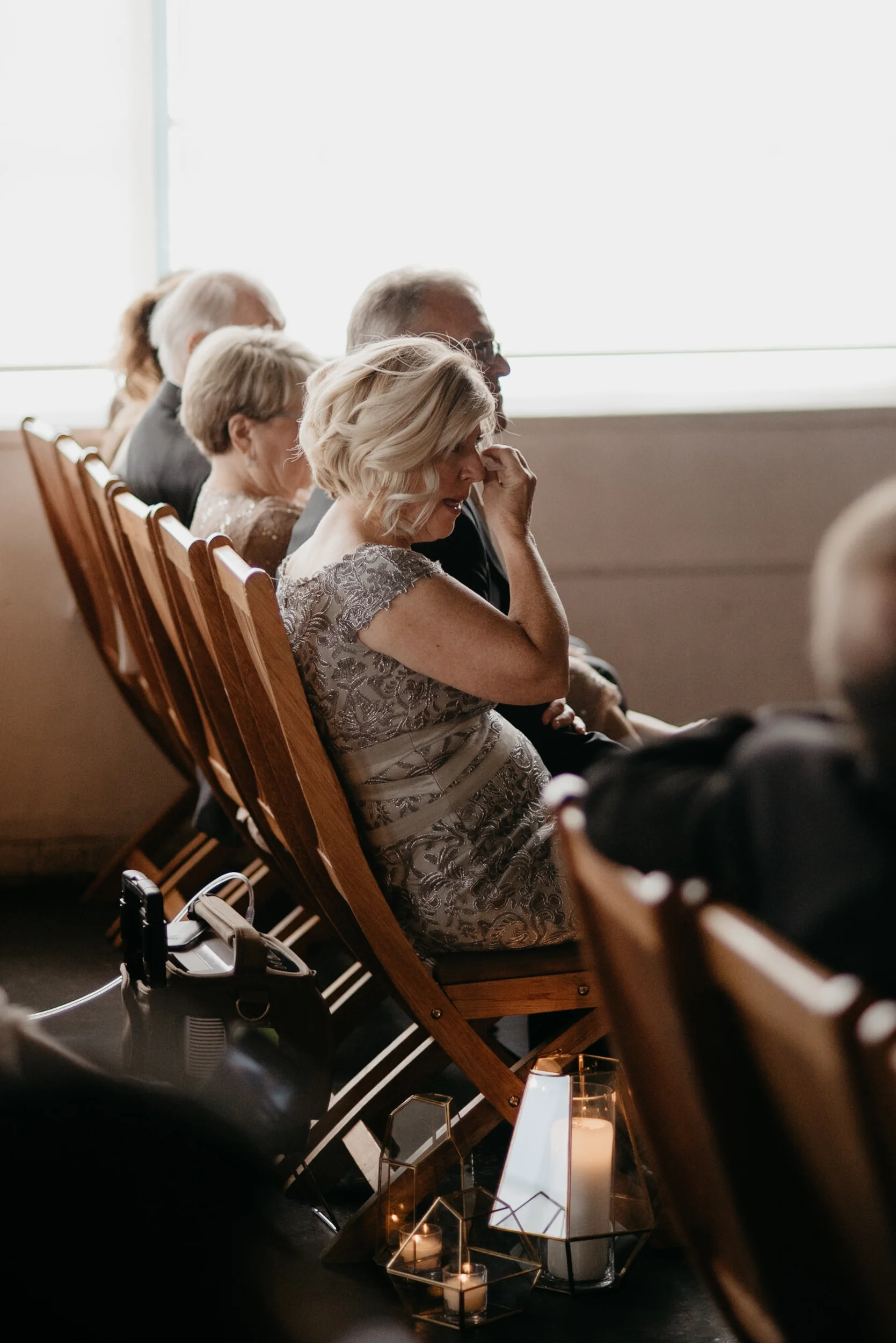  Mom crying at Denver Moss wedding ceremony. Colorado wedding photographer. Downtown Denver wedding venue. 