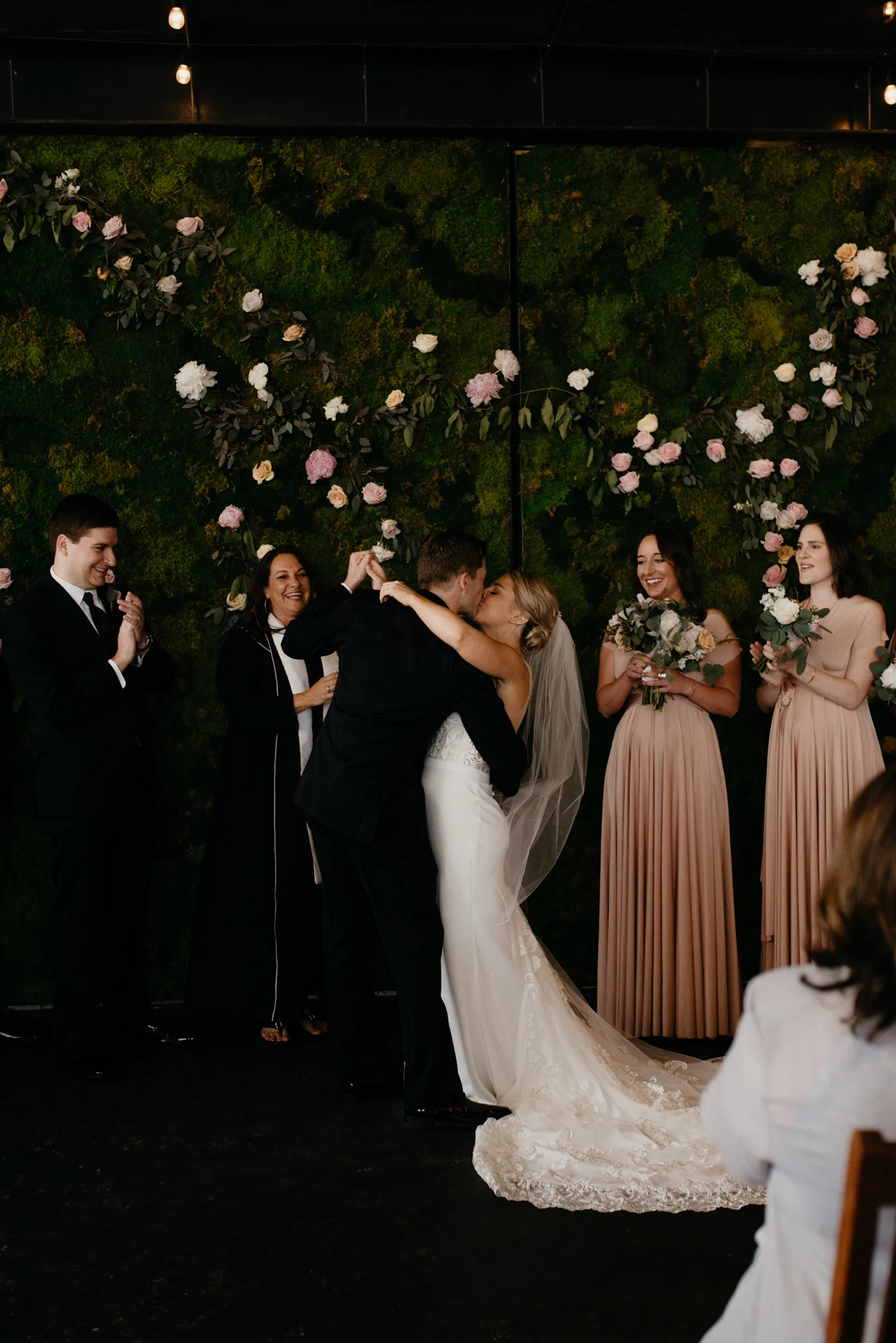  First kiss at Moss Denver wedding. Colorado wedding photographer. 