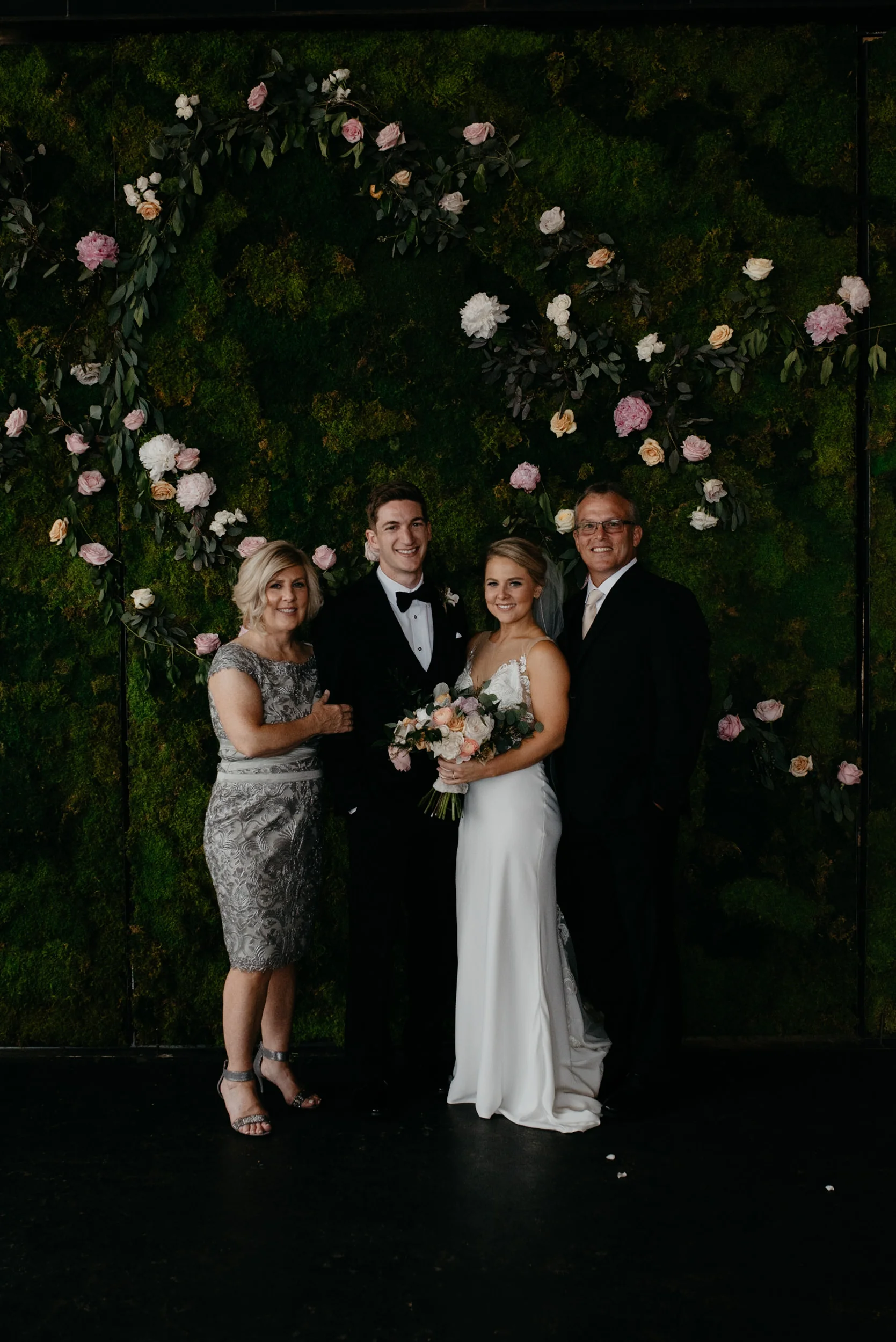  Bride with mom and dad at Moss in Denver. Colorado wedding photographer. 