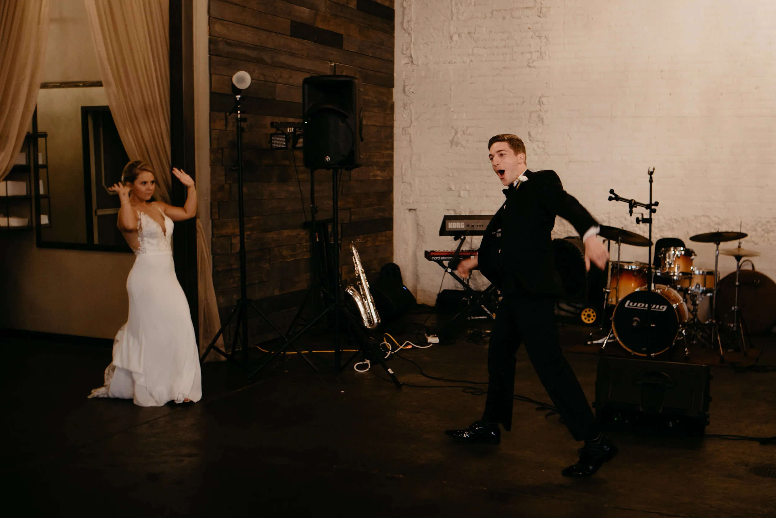  Denver wedding photographer. Moss wedding downtown. Bride and groom entrance. 