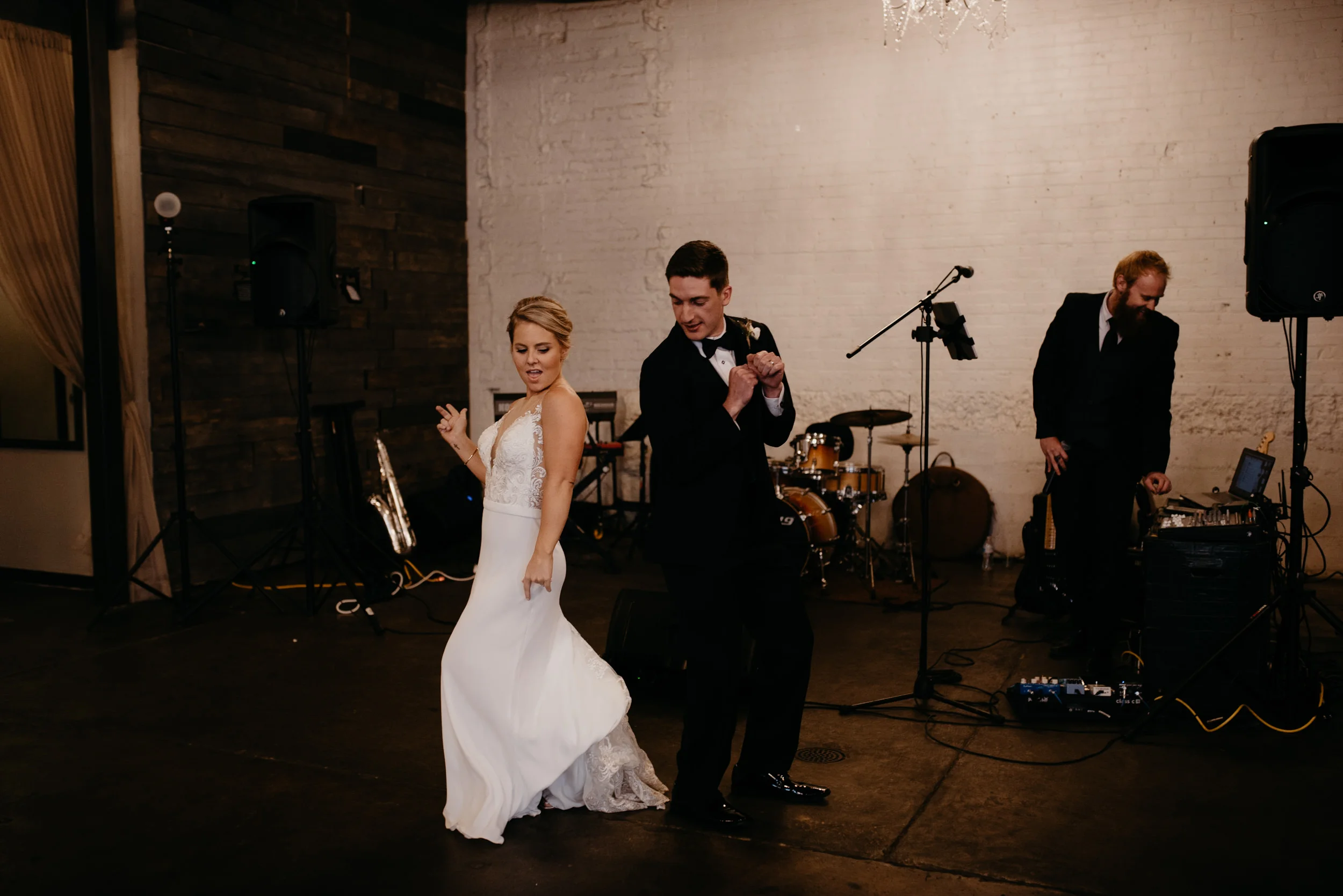  Bride and groom entrance at Moss Denver wedding. Colorado wedding photographer 
