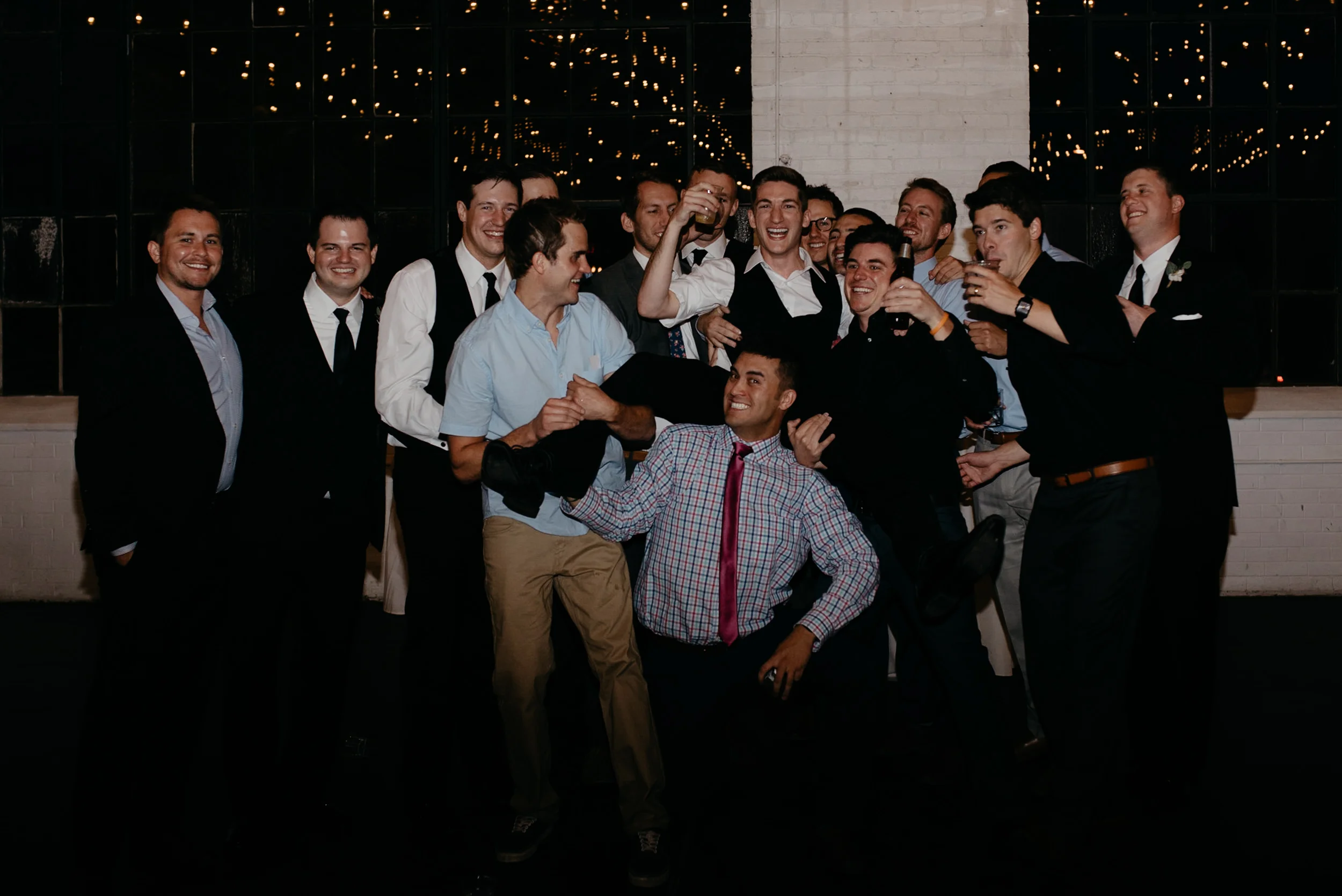  Moss Denver wedding photos of groomsmen. Colorado wedding photos at Moss in Denver. 