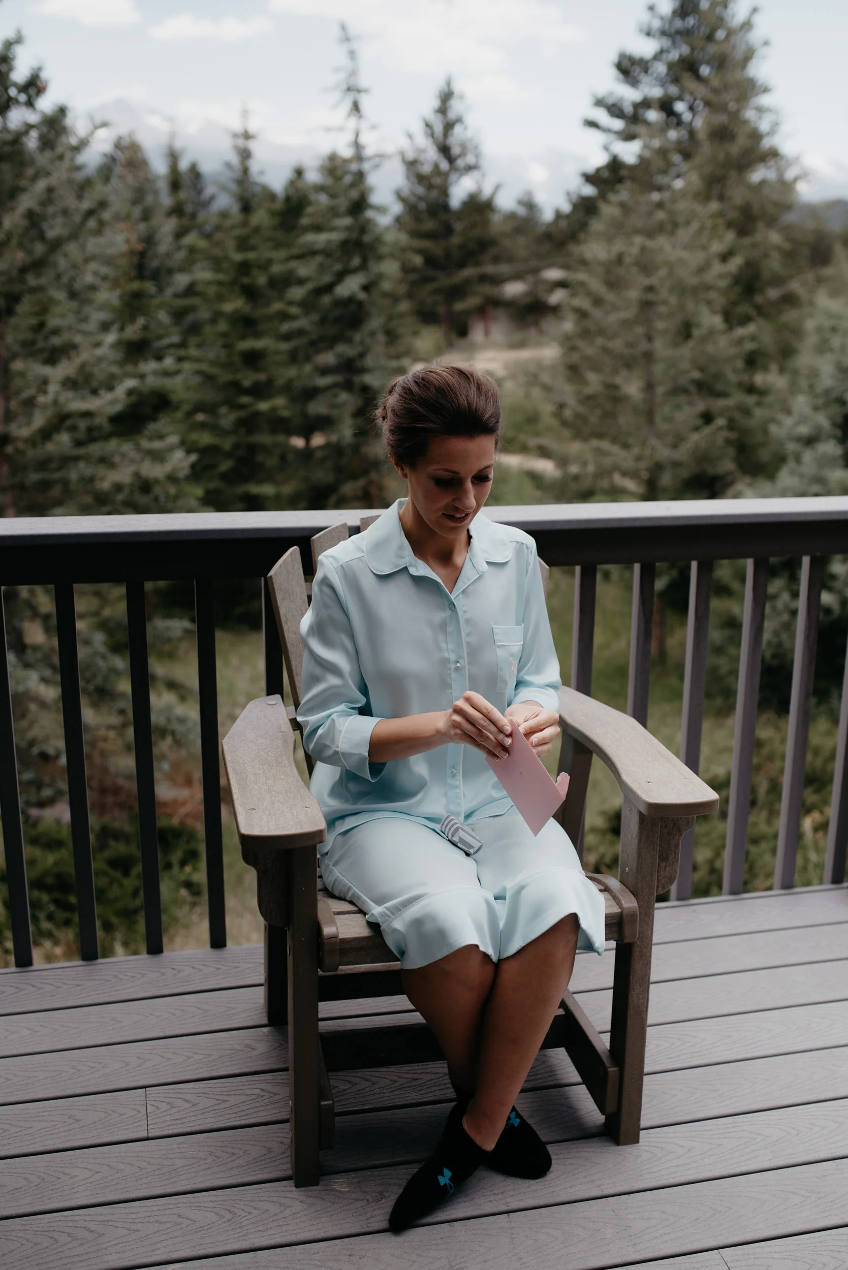  Bride opening gift. Colorado elopement photographer. 