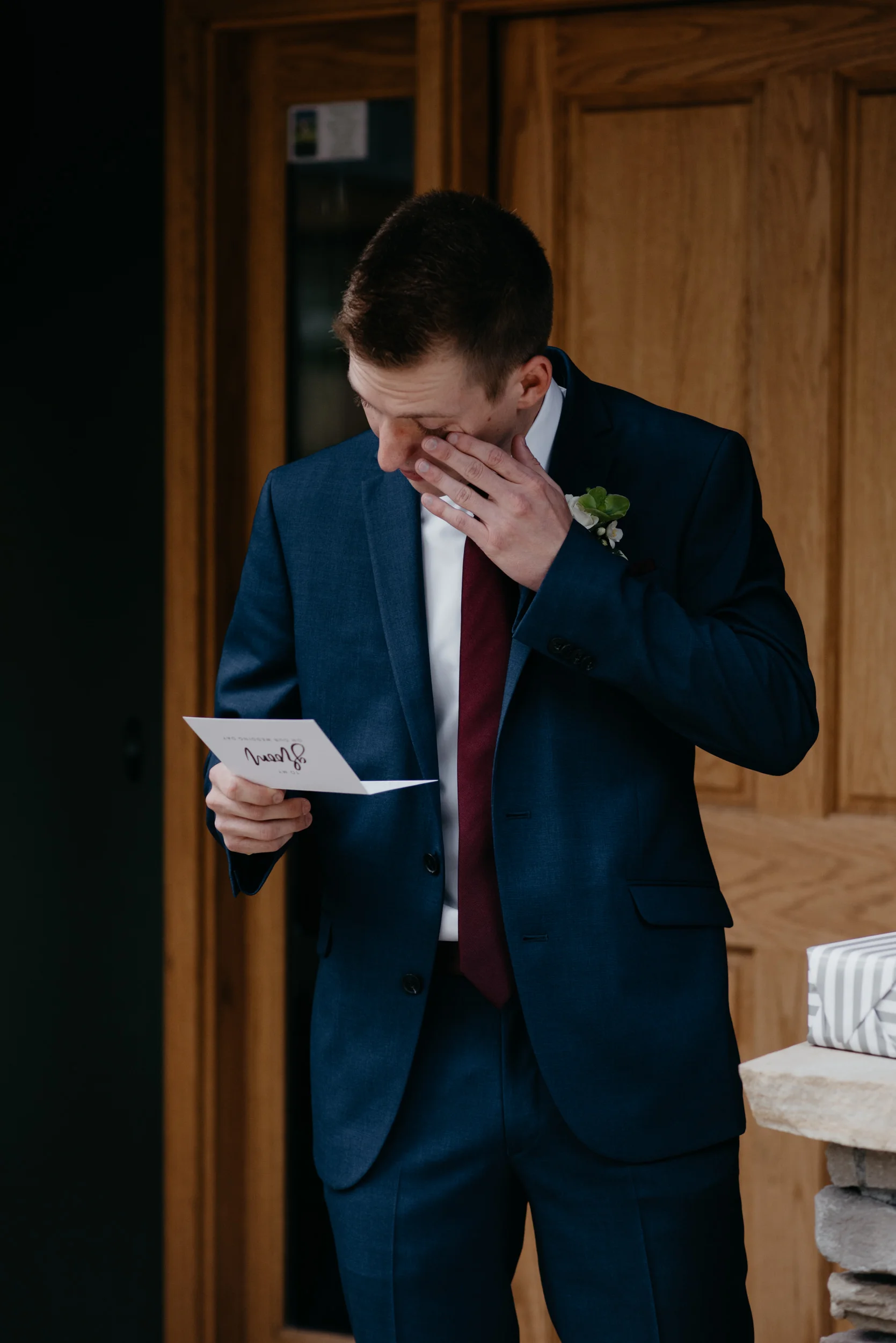  Groom opening gift. 3M Curve, Rocky Mountain National Park elopement. 