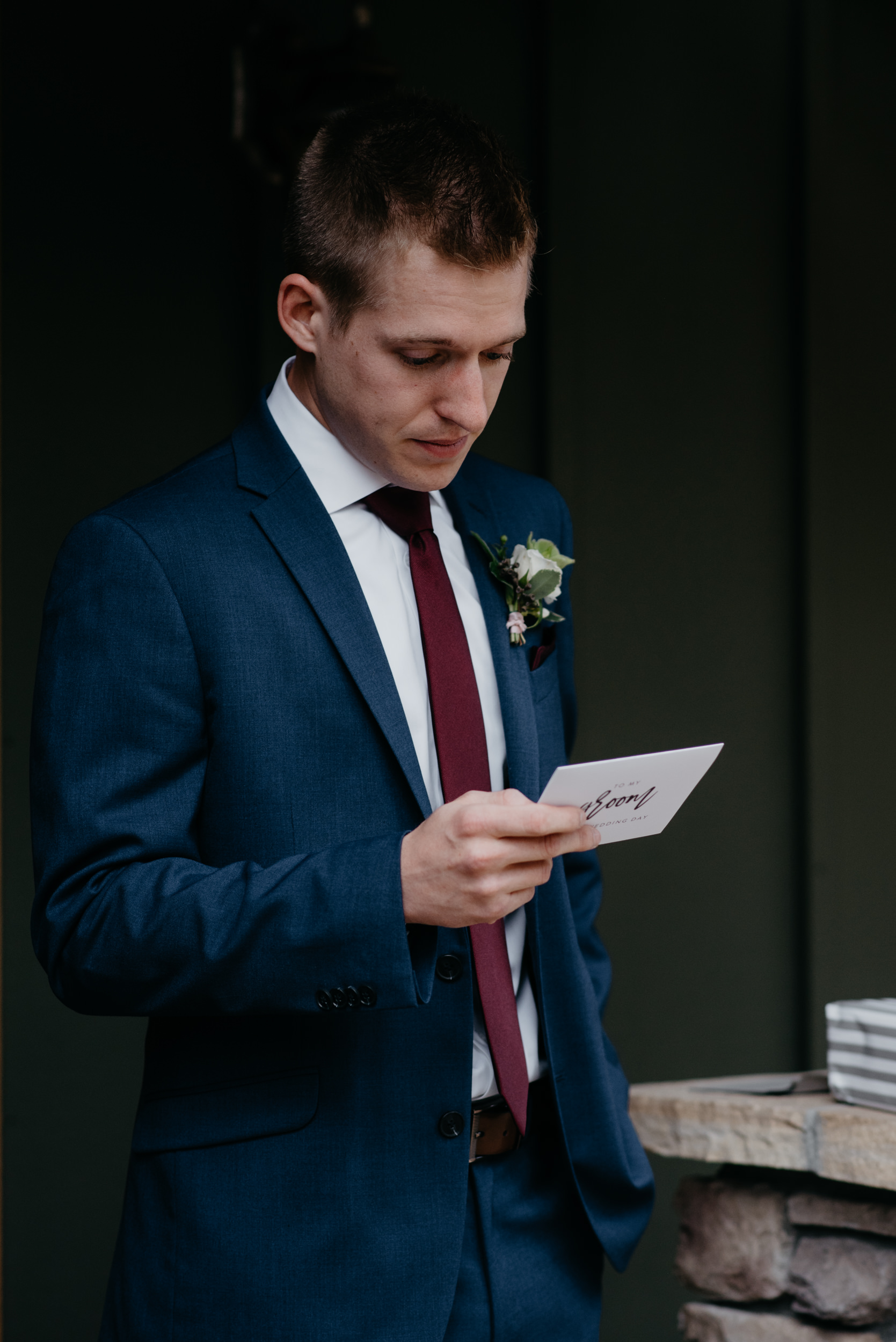  Groom opening gift. 3M Curve, Rocky Mountain National Park elopement photos. Colorado wedding photographer. 